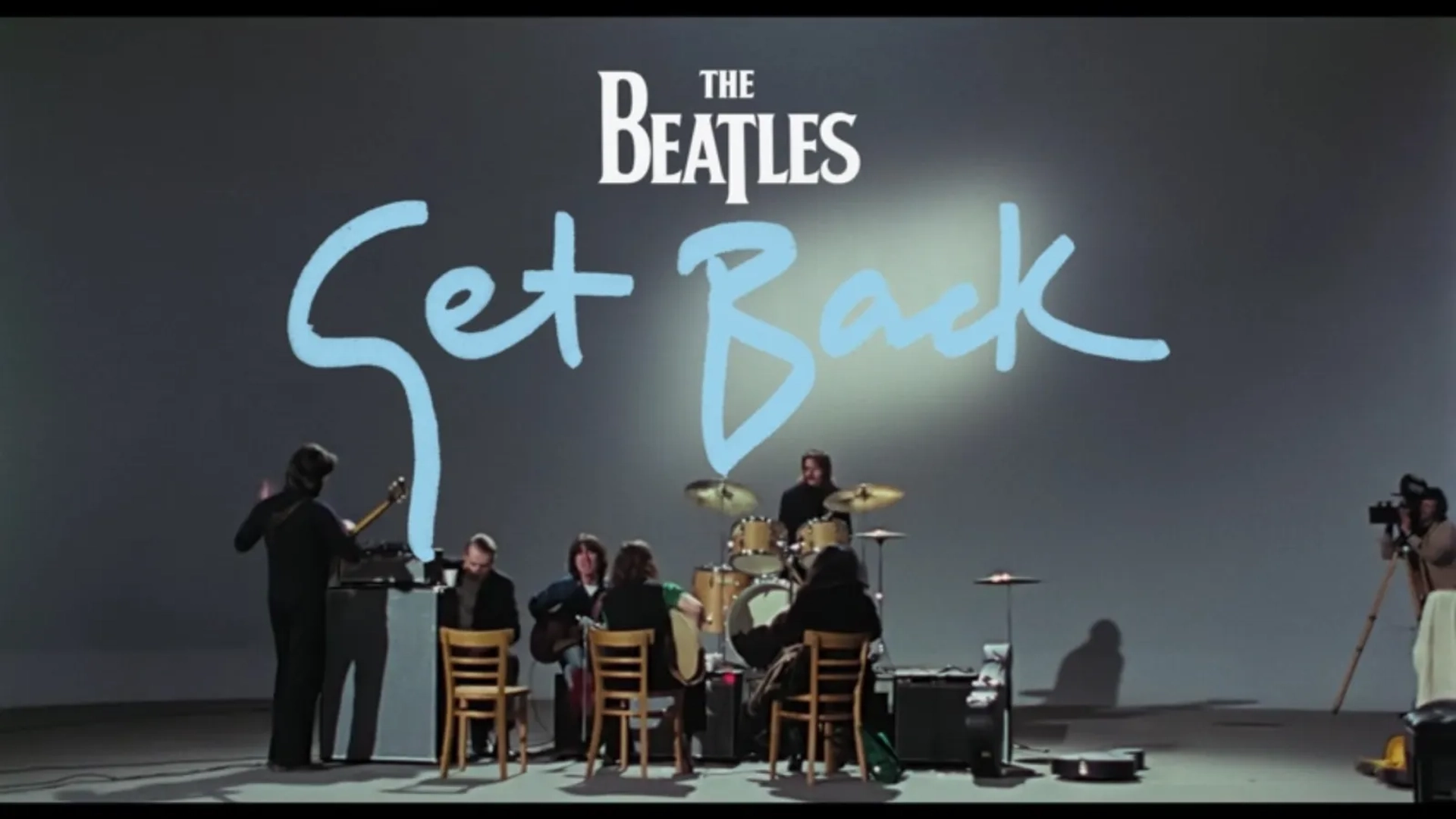 Paul McCartney, John Lennon, George Harrison, George Martin, Yoko Ono, Ringo Starr, and The Beatles in The Beatles: Get Back (2021)