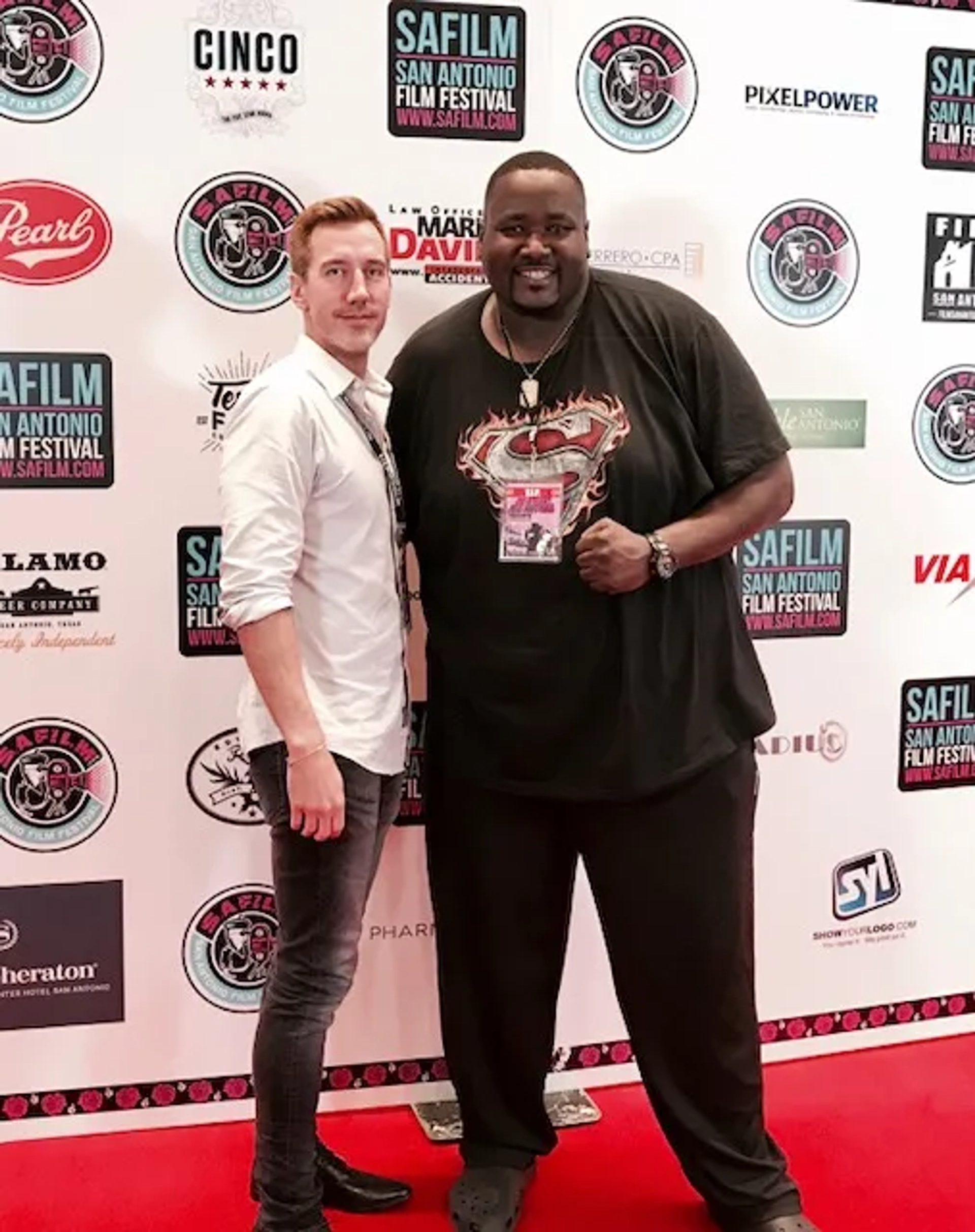 Matthew Sauvé and Quinton Aaron pose for a red carpet photo while promoting their respective films at the San Antonio Film Festival.