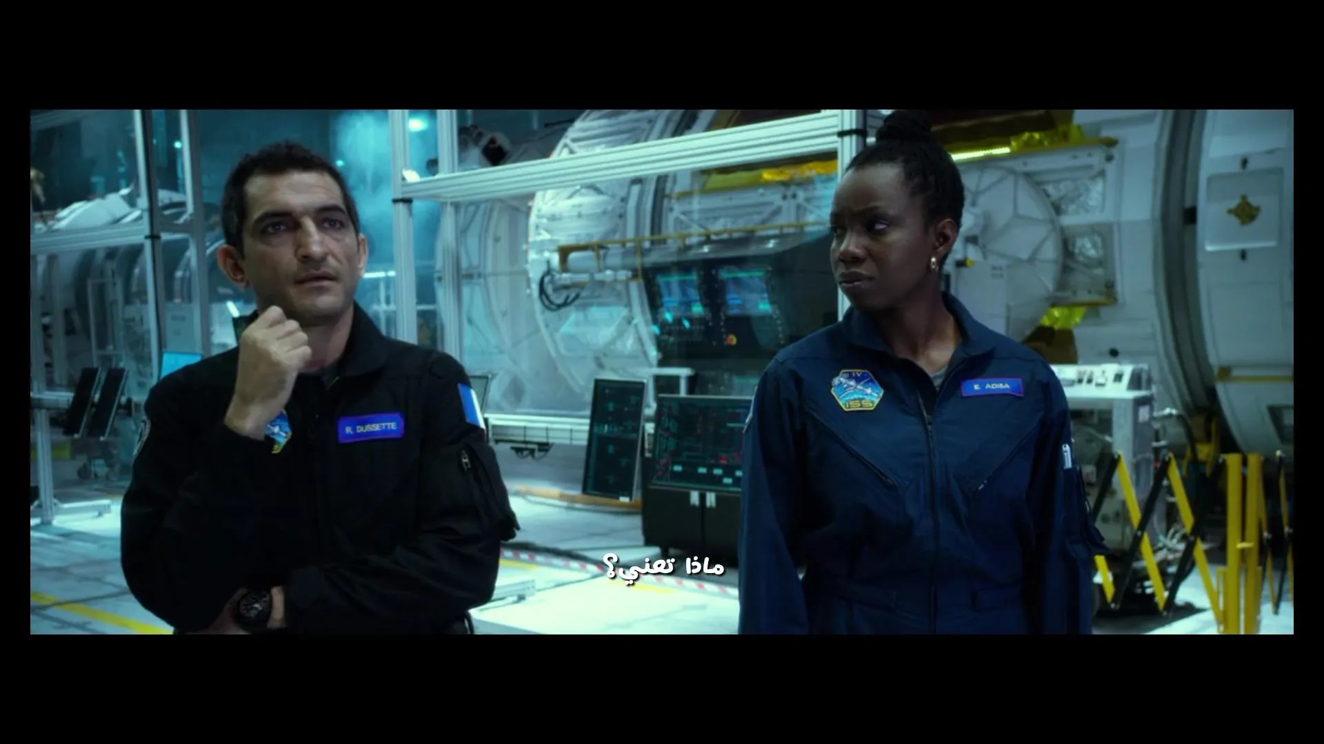 Amr Waked and Adepero Oduye in Geostorm (2017)