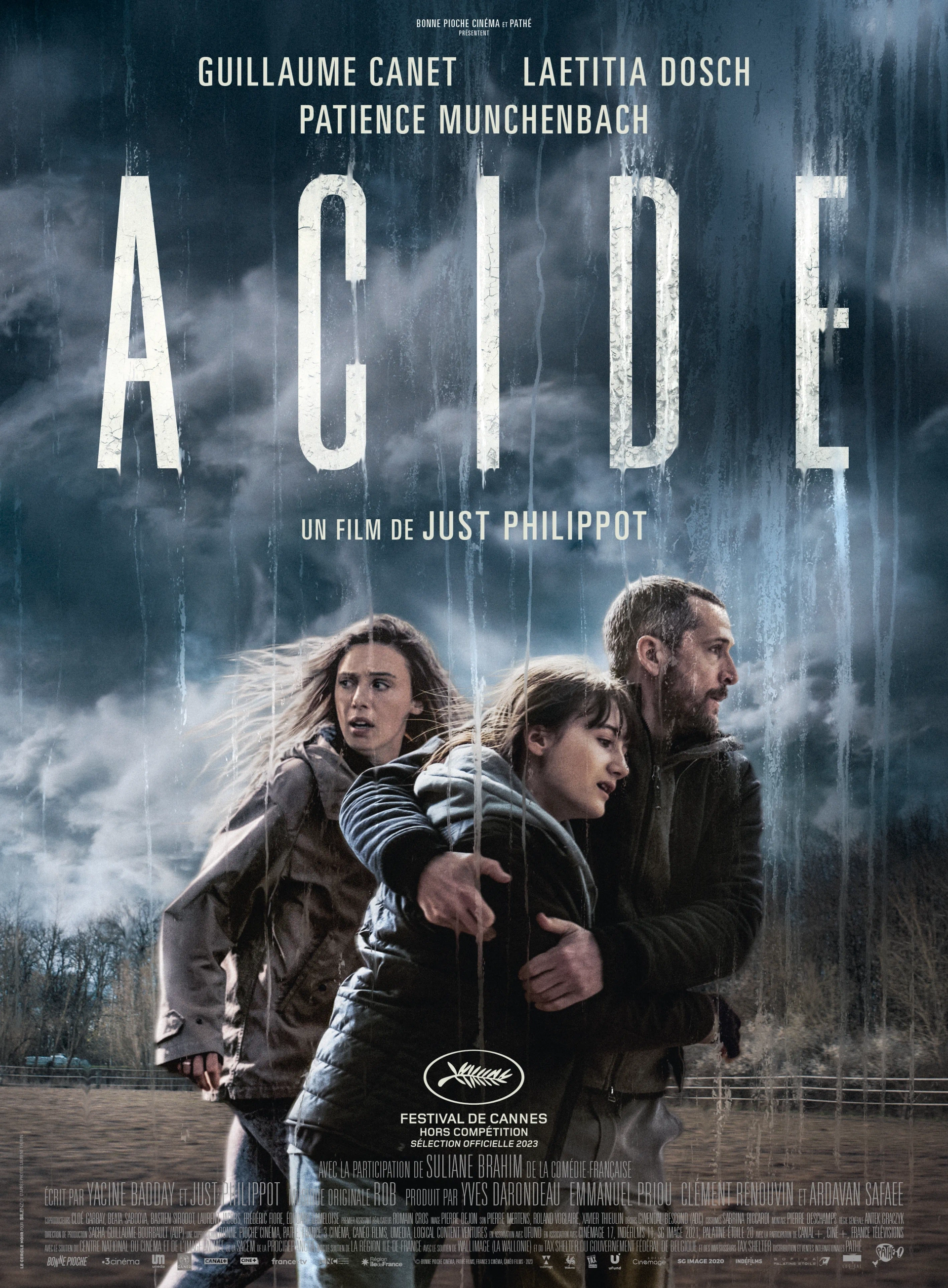 Guillaume Canet, Patience Munchenbach, and Laetitia Dosch in Acid (2023)