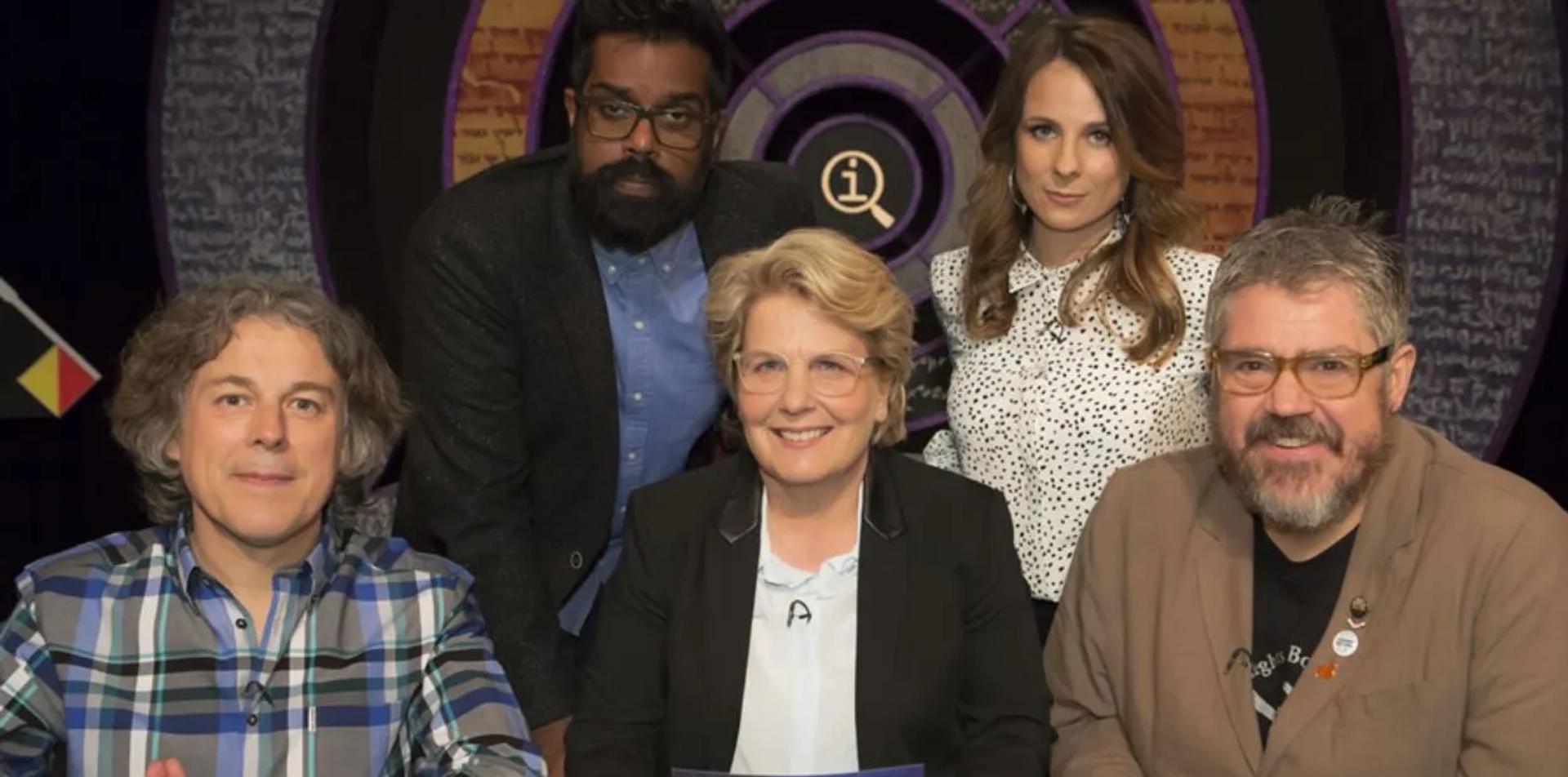 Alan Davies, Phill Jupitus, Sandi Toksvig, Cariad Lloyd, and Romesh Ranganathan in QI (2003)