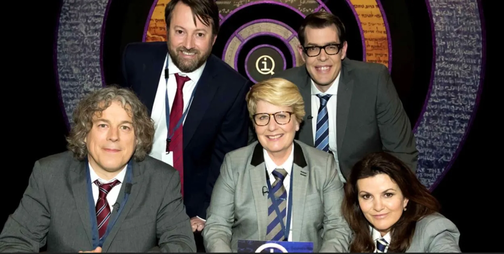 Alan Davies, David Mitchell, Deirdre O'Kane, Richard Osman, and Sandi Toksvig in QI (2003)