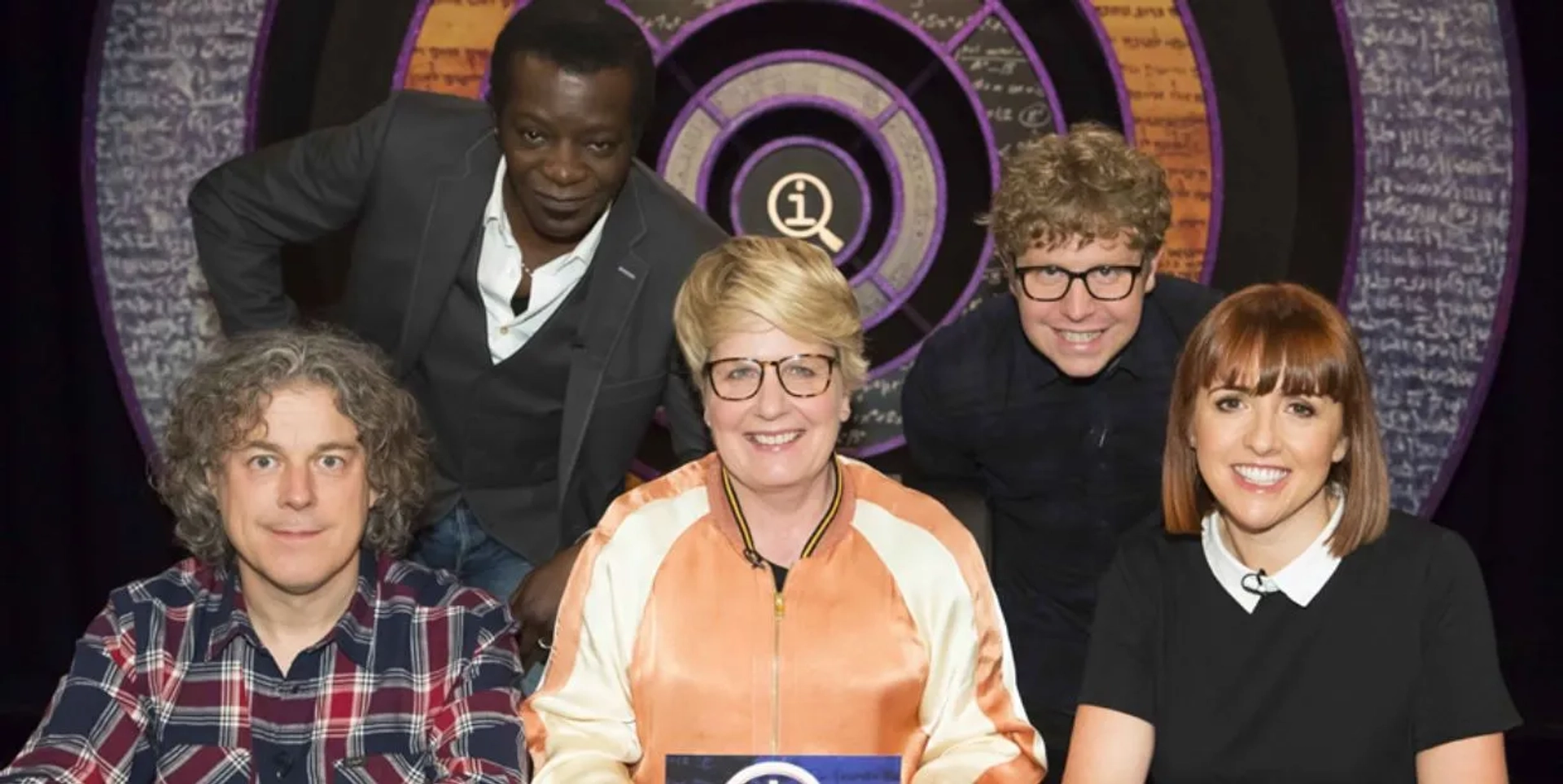 Alan Davies, Sandi Toksvig, Stephen K. Amos, Josh Widdicombe, and Cally Beaton in QI (2003)