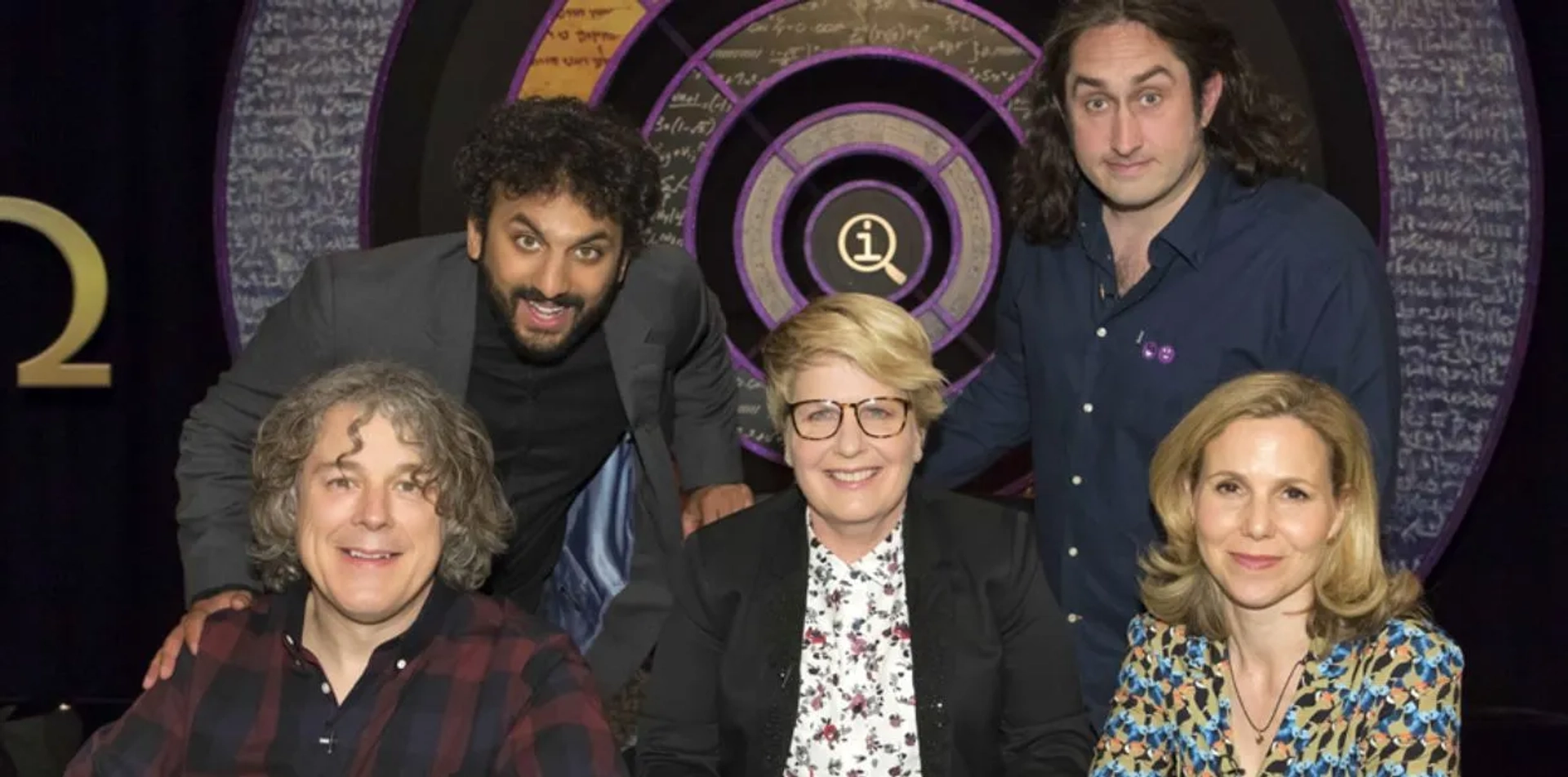 Alan Davies, Ross Noble, Sally Phillips, Sandi Toksvig, and Nish Kumar in QI (2003)