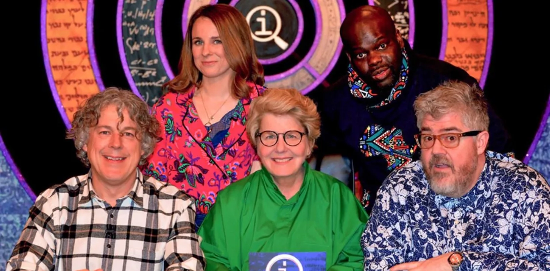 Alan Davies, Phill Jupitus, Sandi Toksvig, Cariad Lloyd, and Daliso Chaponda in QI (2003)