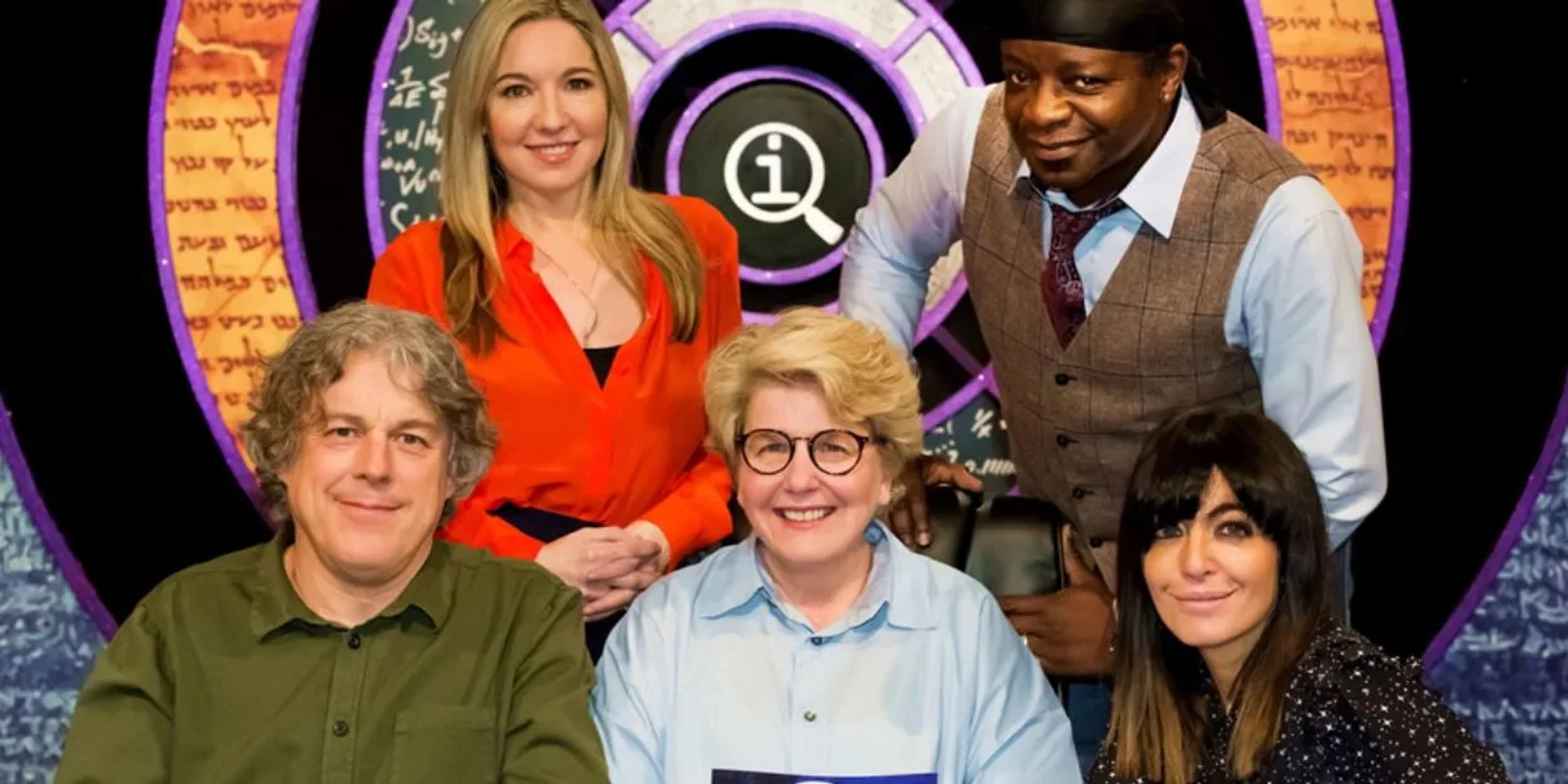 Alan Davies, Sandi Toksvig, Claudia Winkleman, Stephen K. Amos, and Victoria Coren Mitchell in QI (2003)