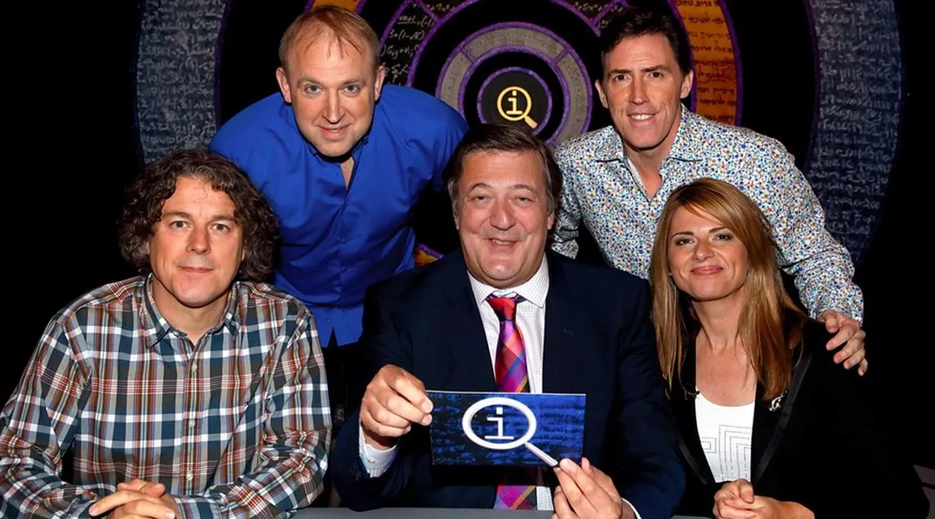 Stephen Fry, Rob Brydon, Alan Davies, Julia Zemiro, and Tim Vine in QI (2003)