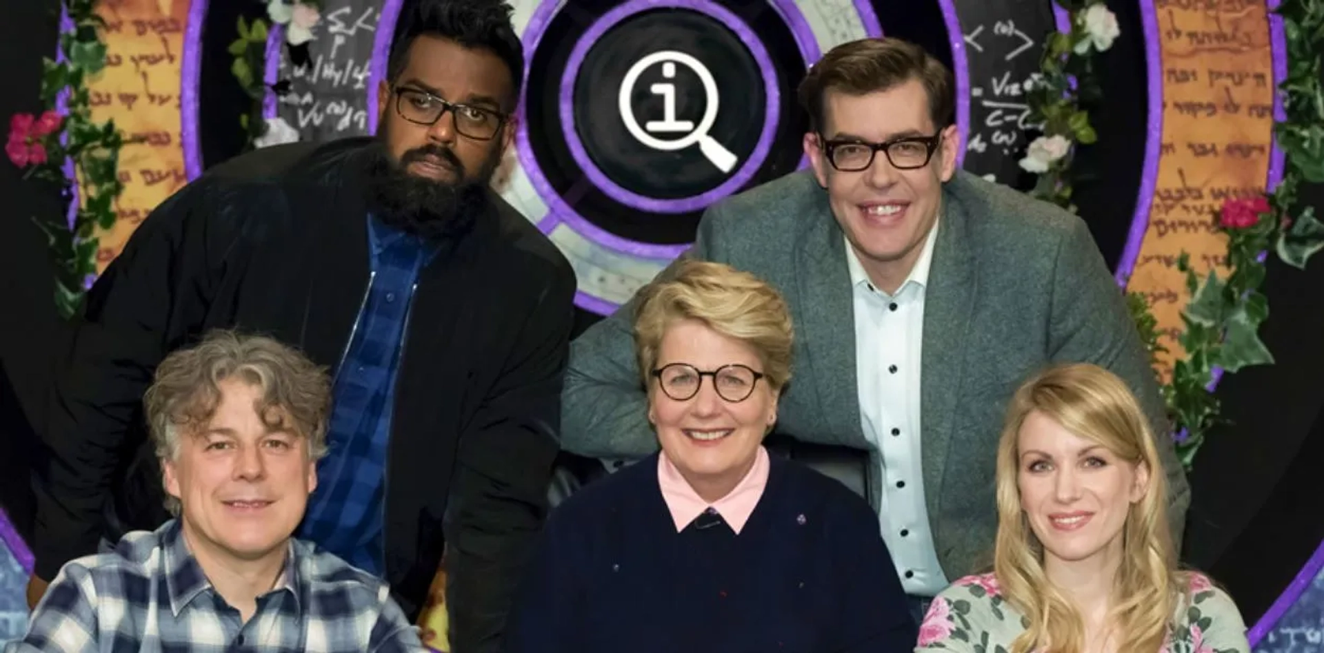 Alan Davies, Richard Osman, Sandi Toksvig, Romesh Ranganathan, and Rachel Parris in QI (2003)