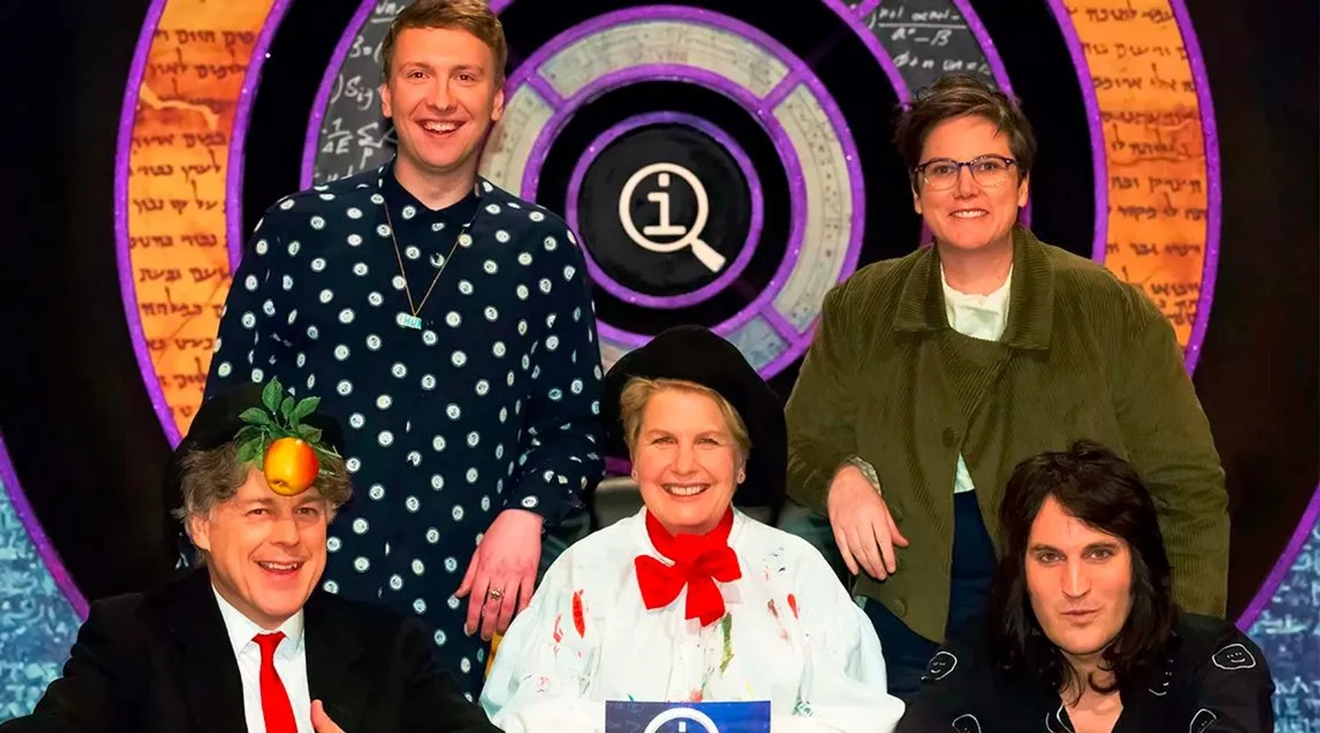 Alan Davies, Noel Fielding, Sandi Toksvig, Hannah Gadsby, and Joe Lycett in QI (2003)