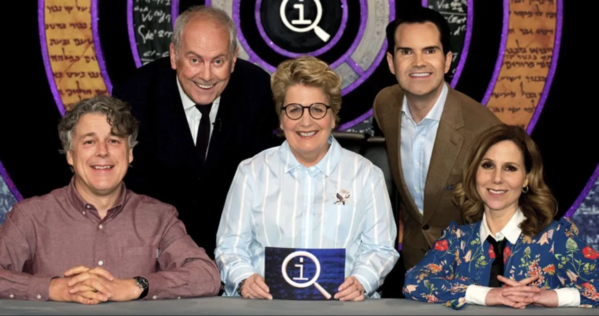 Jimmy Carr, Alan Davies, Sally Phillips, Sandi Toksvig, and Gyles Brandreth in QI (2003)