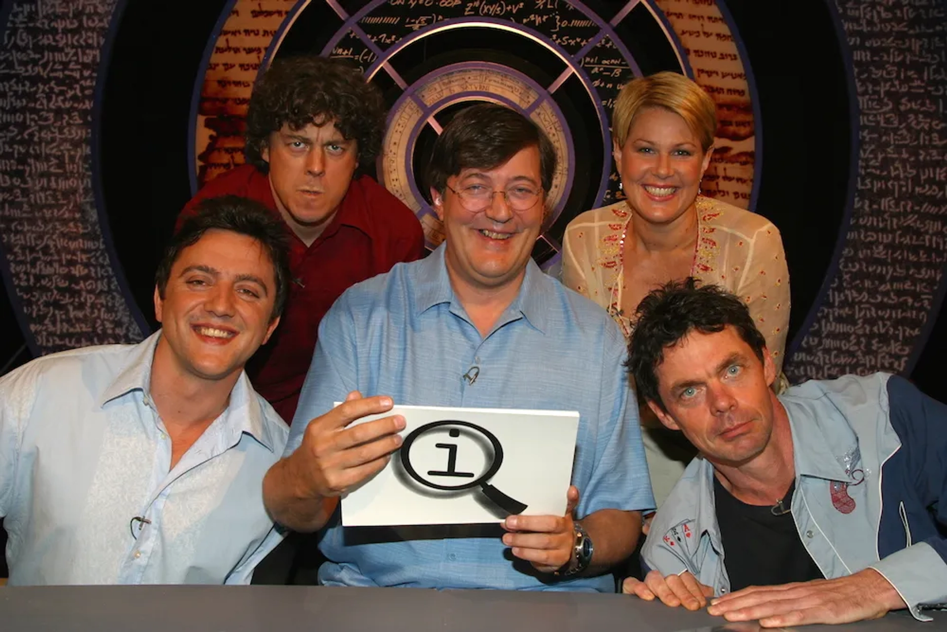 Stephen Fry, Alan Davies, Rich Hall, Julia Morris, and Peter Serafinowicz in QI (2003)