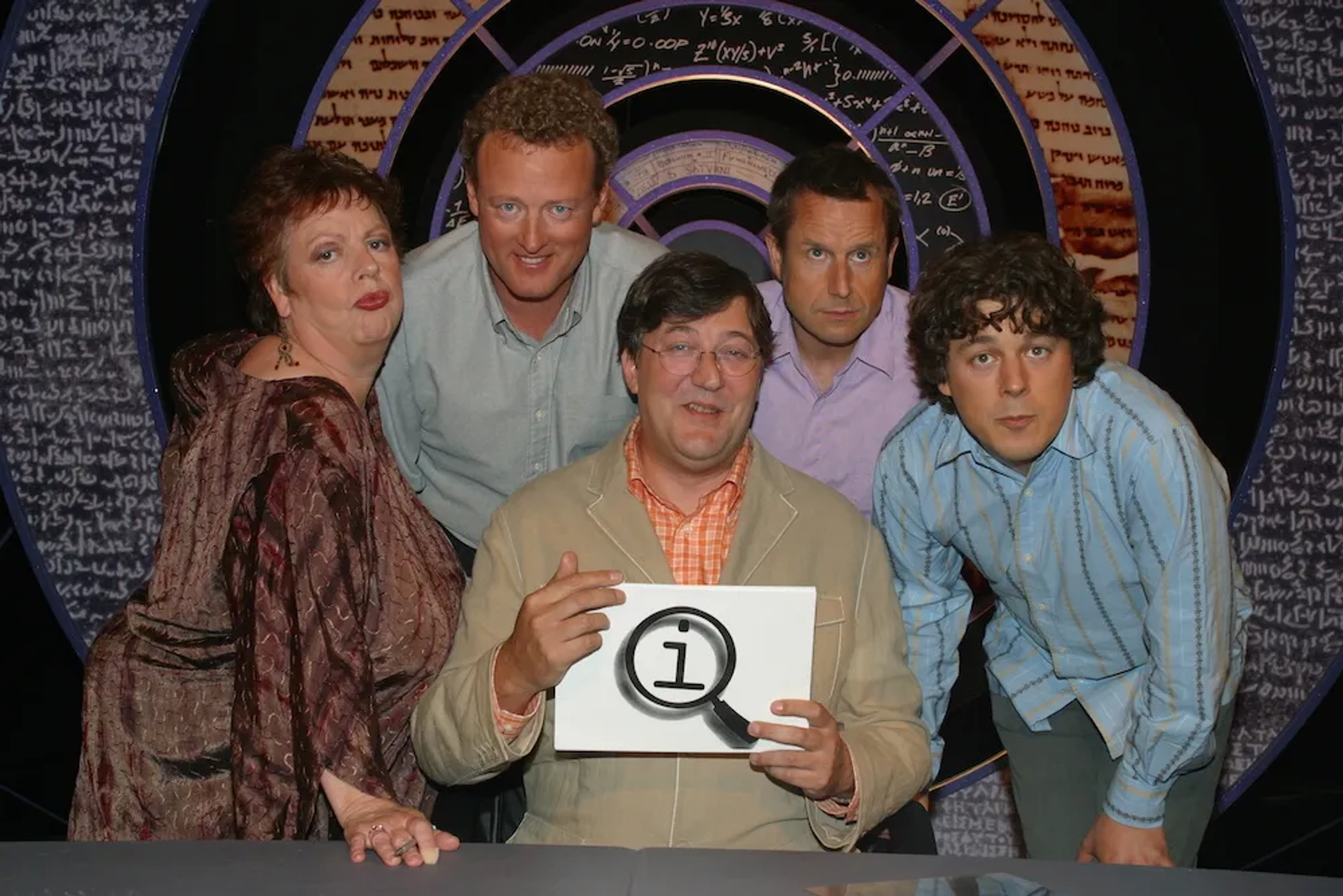 Stephen Fry, Jo Brand, Alan Davies, Howard Goodall, and Jeremy Hardy in QI (2003)