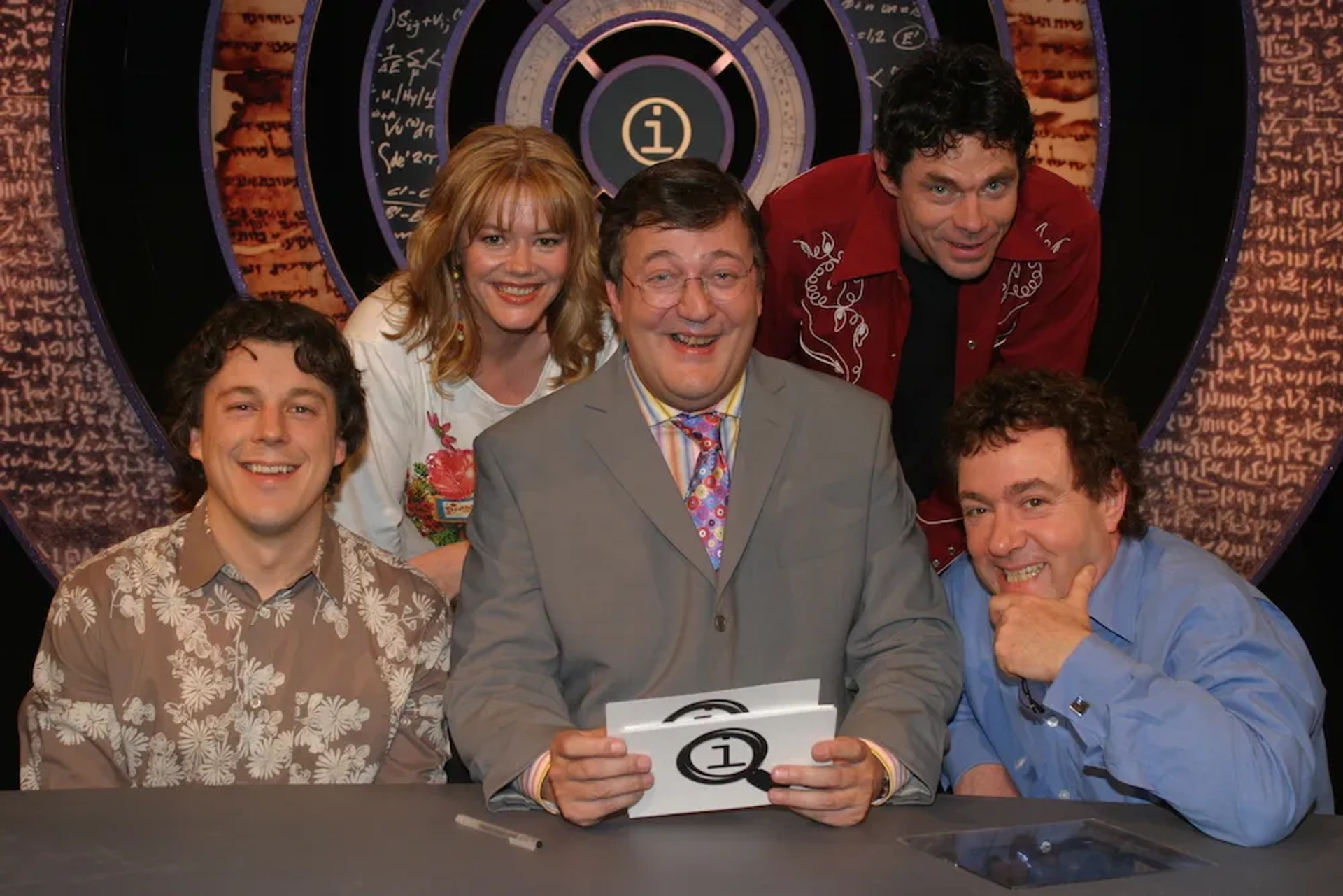 Stephen Fry, Alan Davies, Rich Hall, Josie Lawrence, and John Sessions in QI (2003)