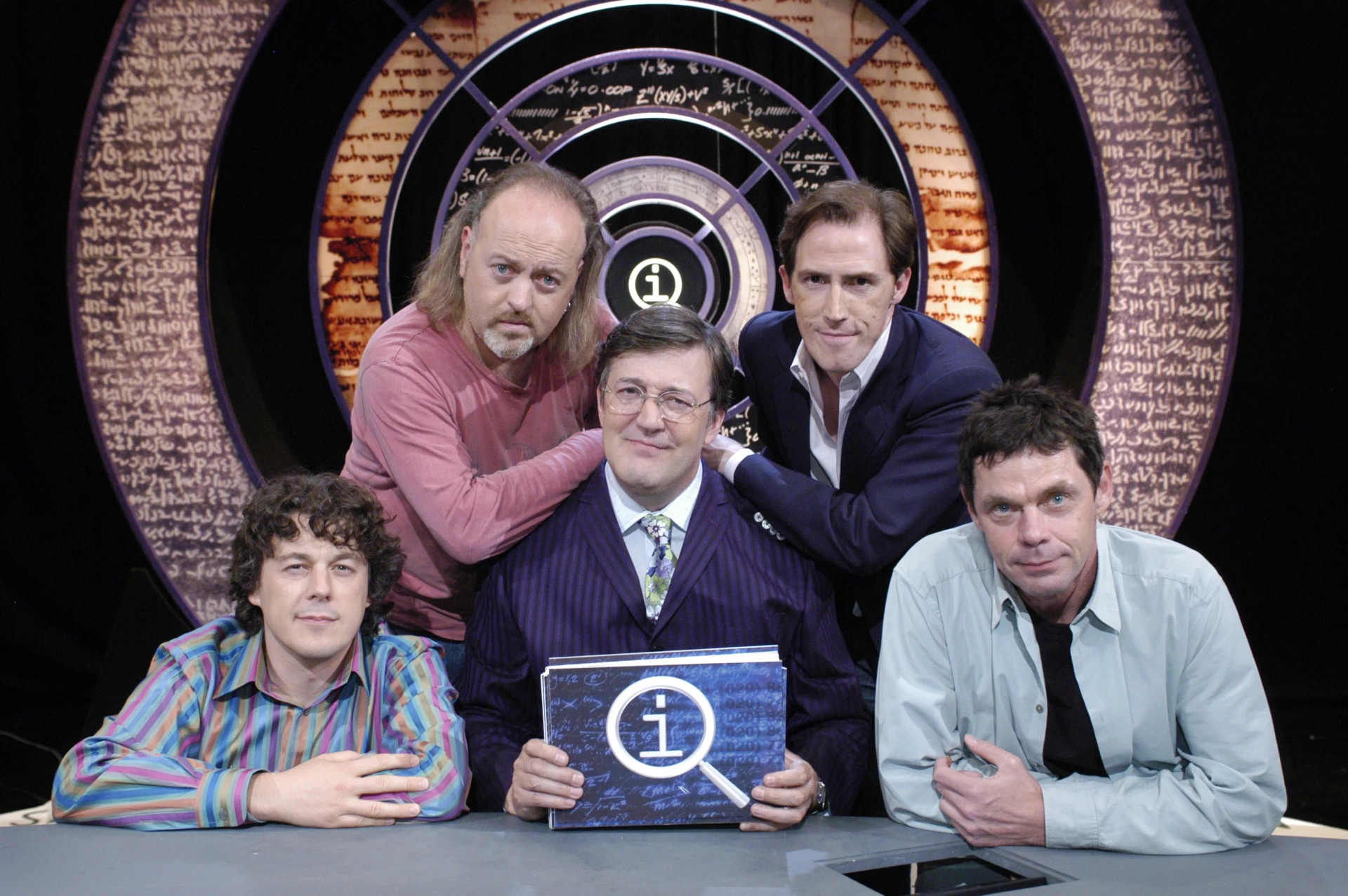 Stephen Fry, Bill Bailey, Rob Brydon, Alan Davies, and Rich Hall in QI (2003)