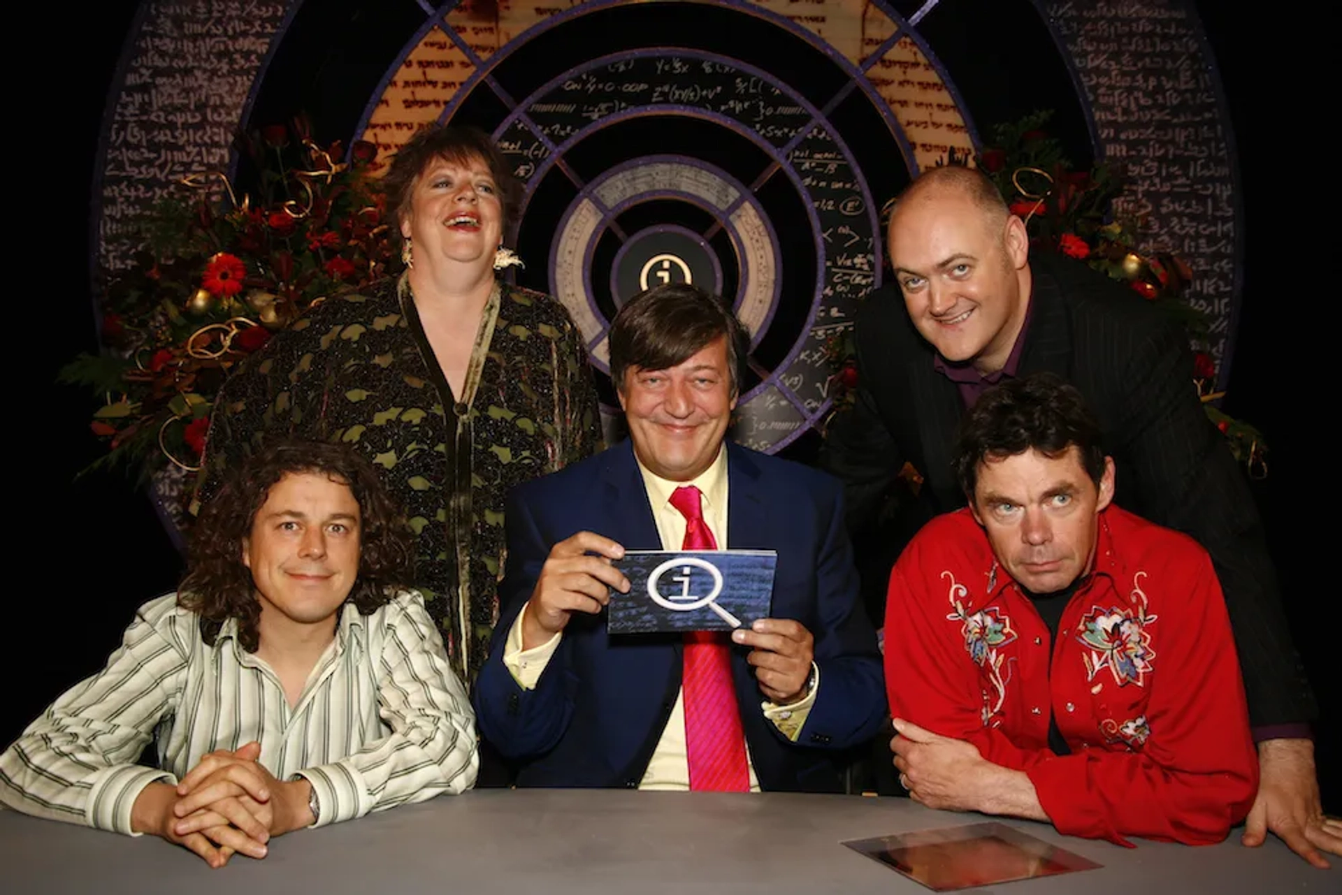 Stephen Fry, Jo Brand, Alan Davies, Rich Hall, and Dara O Briain in QI (2003)