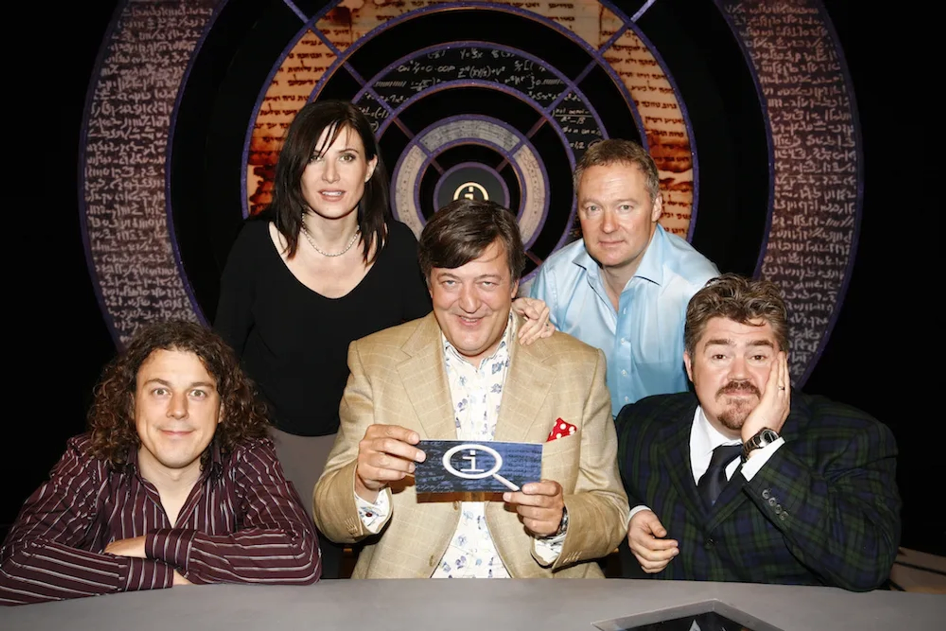 Stephen Fry, Ronni Ancona, Rory Bremner, Alan Davies, and Phill Jupitus in QI (2003)