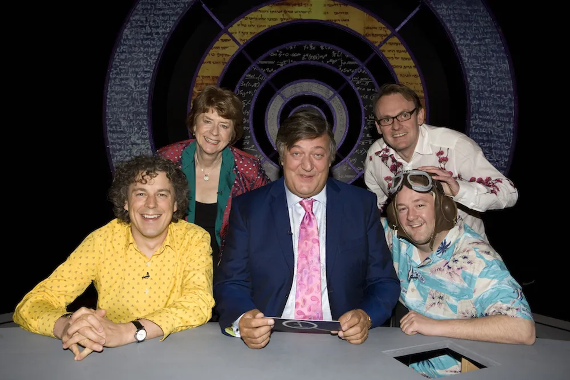 Stephen Fry, Pam Ayres, Alan Davies, Sean Lock, and Johnny Vegas in QI (2003)