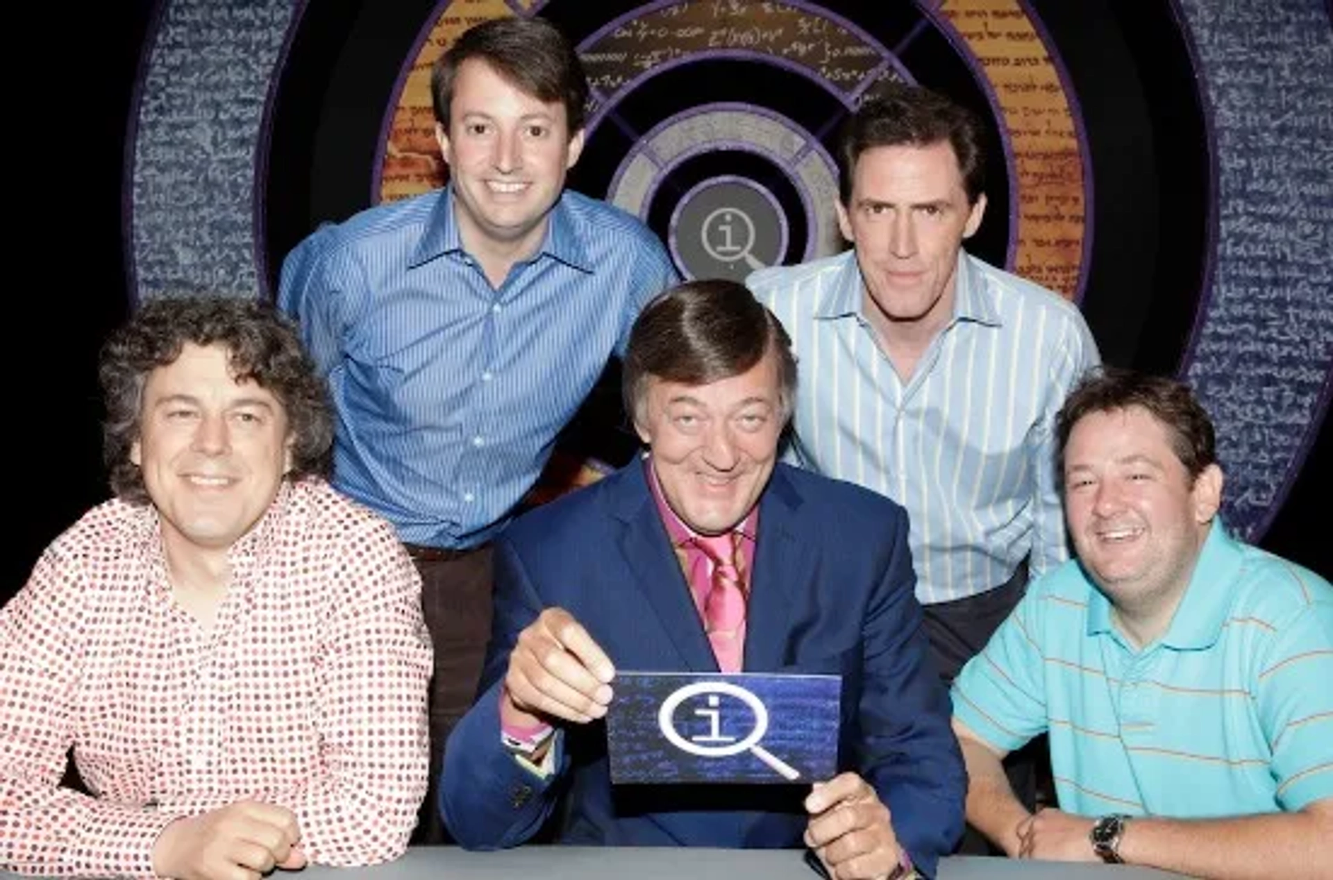 Stephen Fry, Rob Brydon, Alan Davies, David Mitchell, and Johnny Vegas in QI (2003)