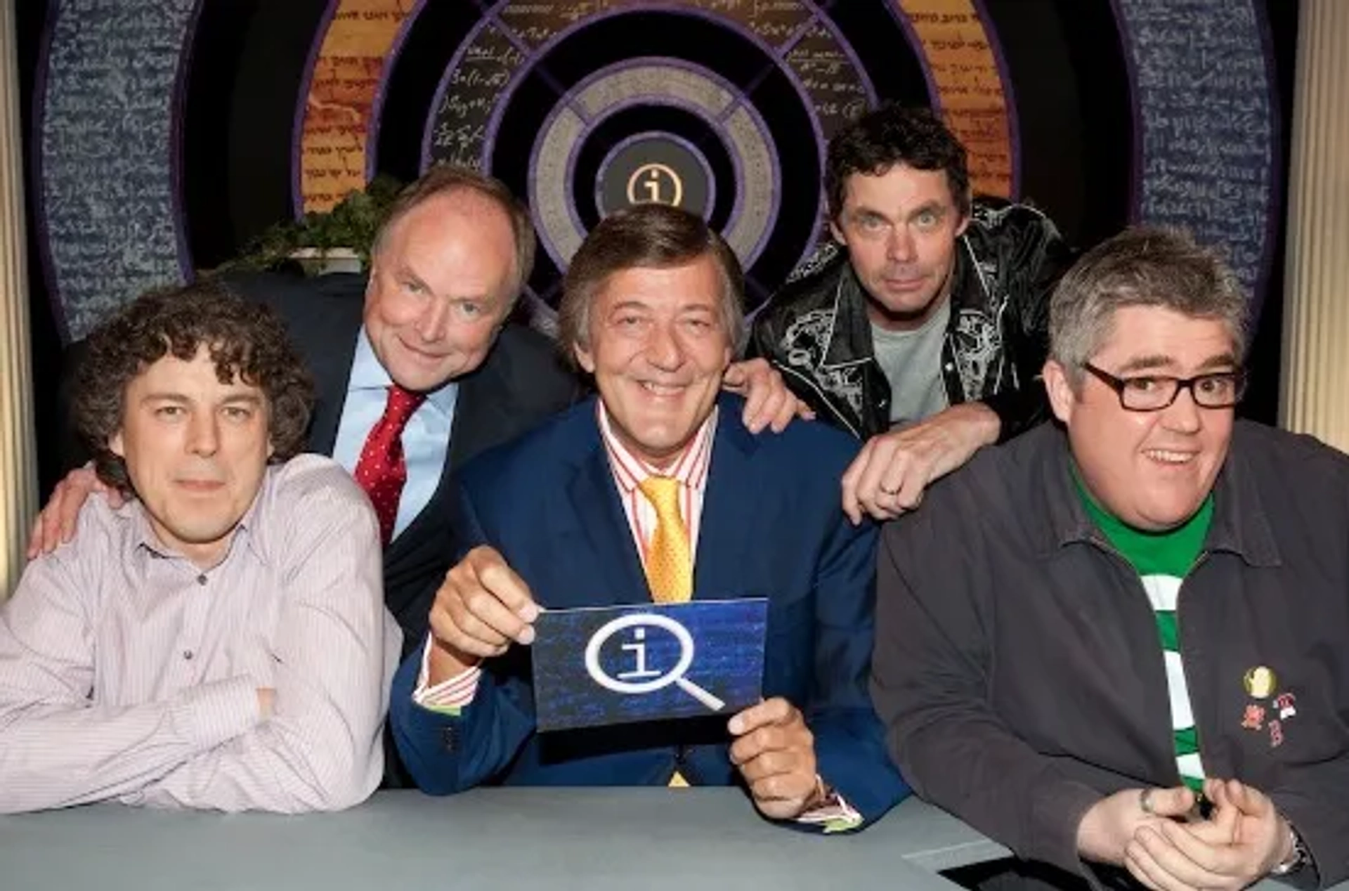 Stephen Fry, Clive Anderson, Alan Davies, Rich Hall, and Phill Jupitus in QI (2003)