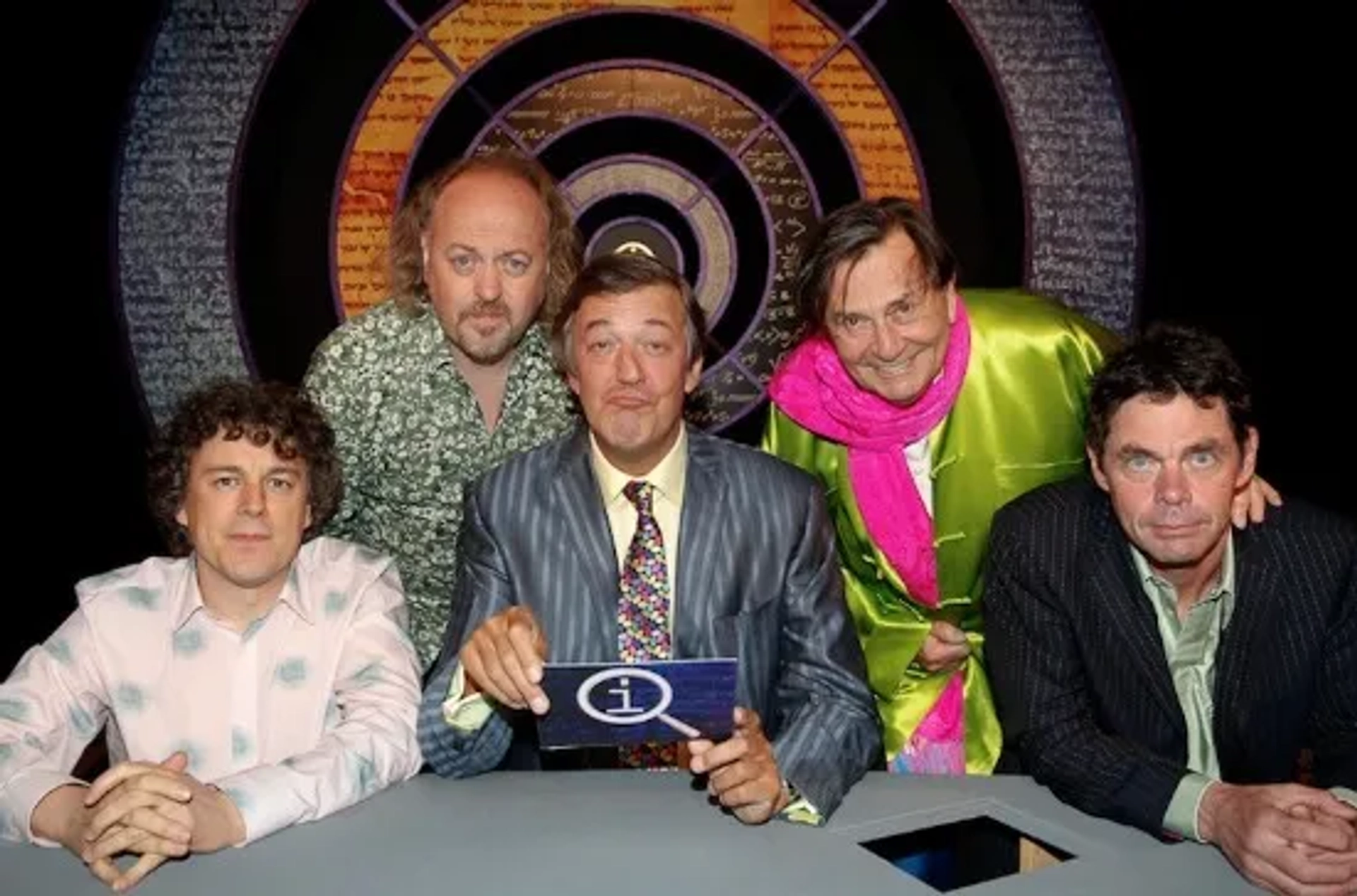 Stephen Fry, Bill Bailey, Alan Davies, Rich Hall, and Barry Humphries in QI (2003)