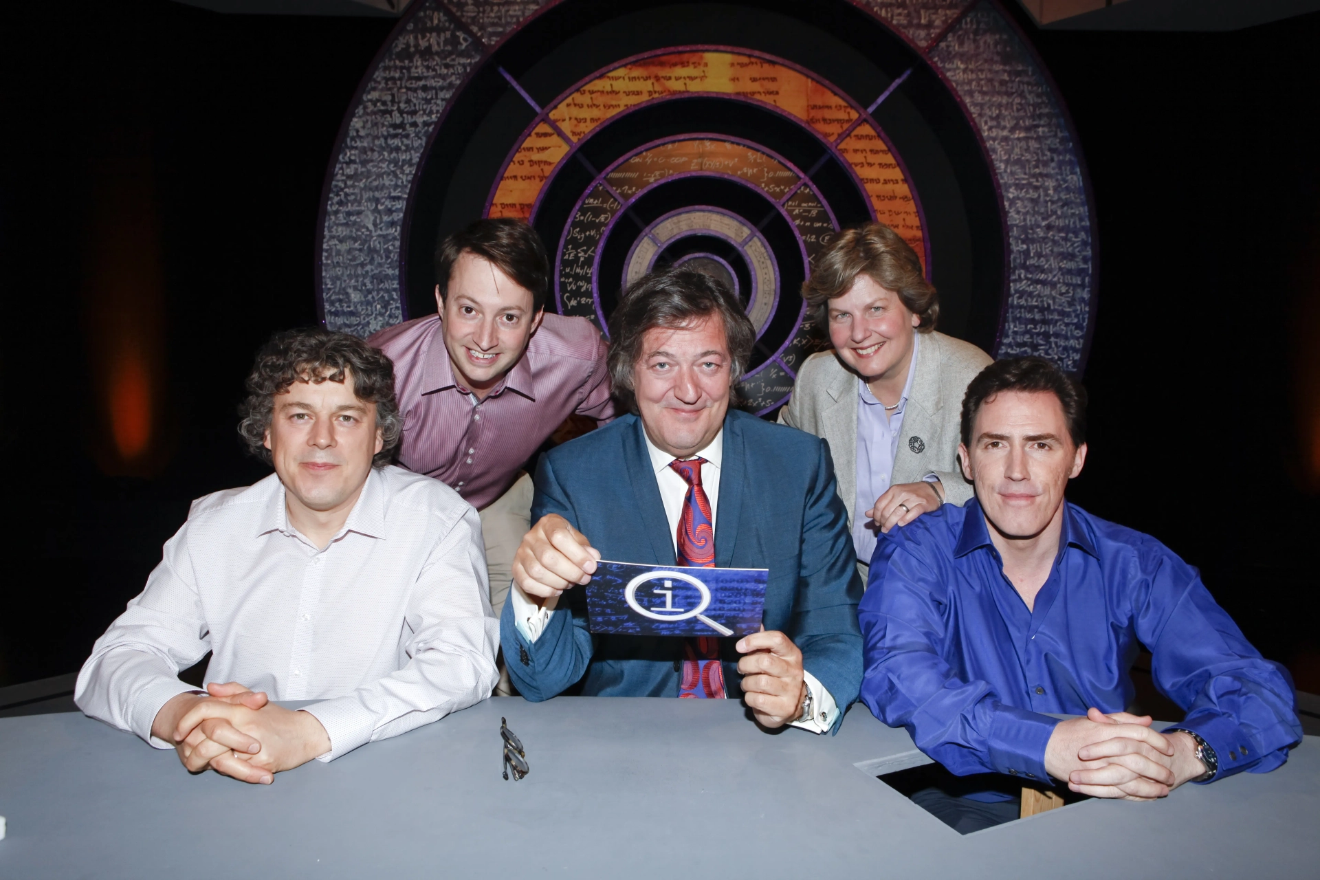 Stephen Fry, Rob Brydon, Alan Davies, David Mitchell, and Sandi Toksvig in QI (2003)