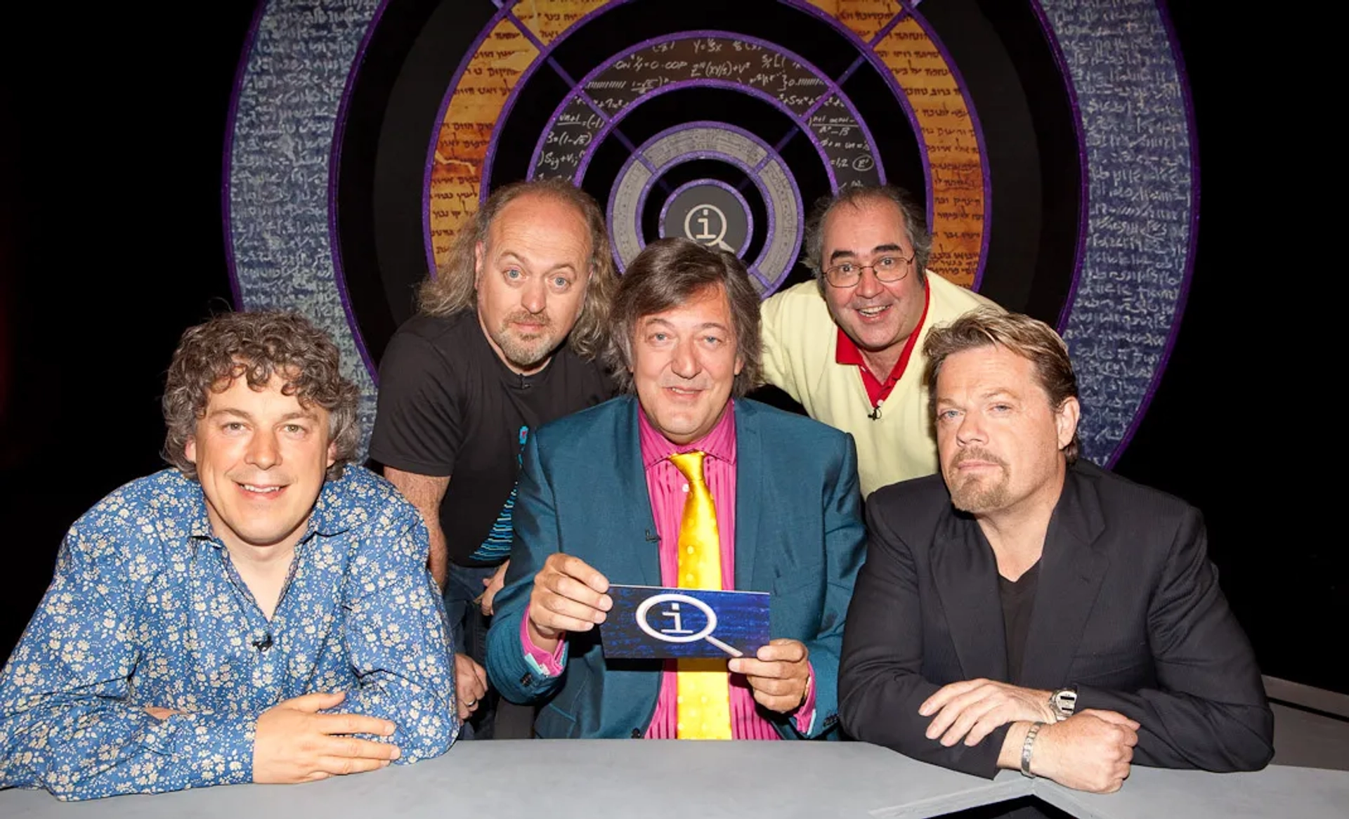 Stephen Fry, Bill Bailey, Danny Baker, Alan Davies, and Eddie Izzard in QI (2003)