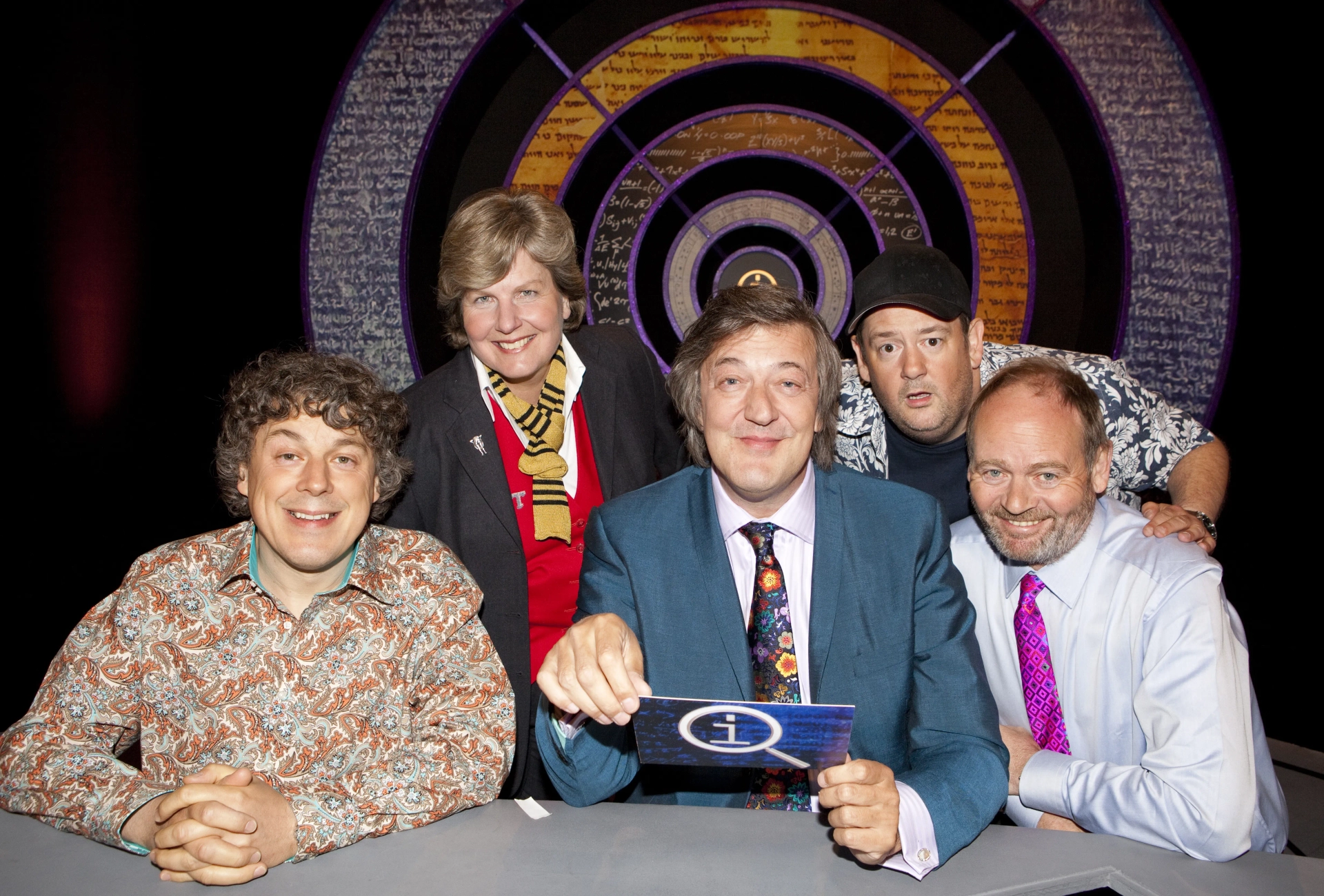 Stephen Fry, Alan Davies, John Lloyd, Sandi Toksvig, and Johnny Vegas in QI (2003)