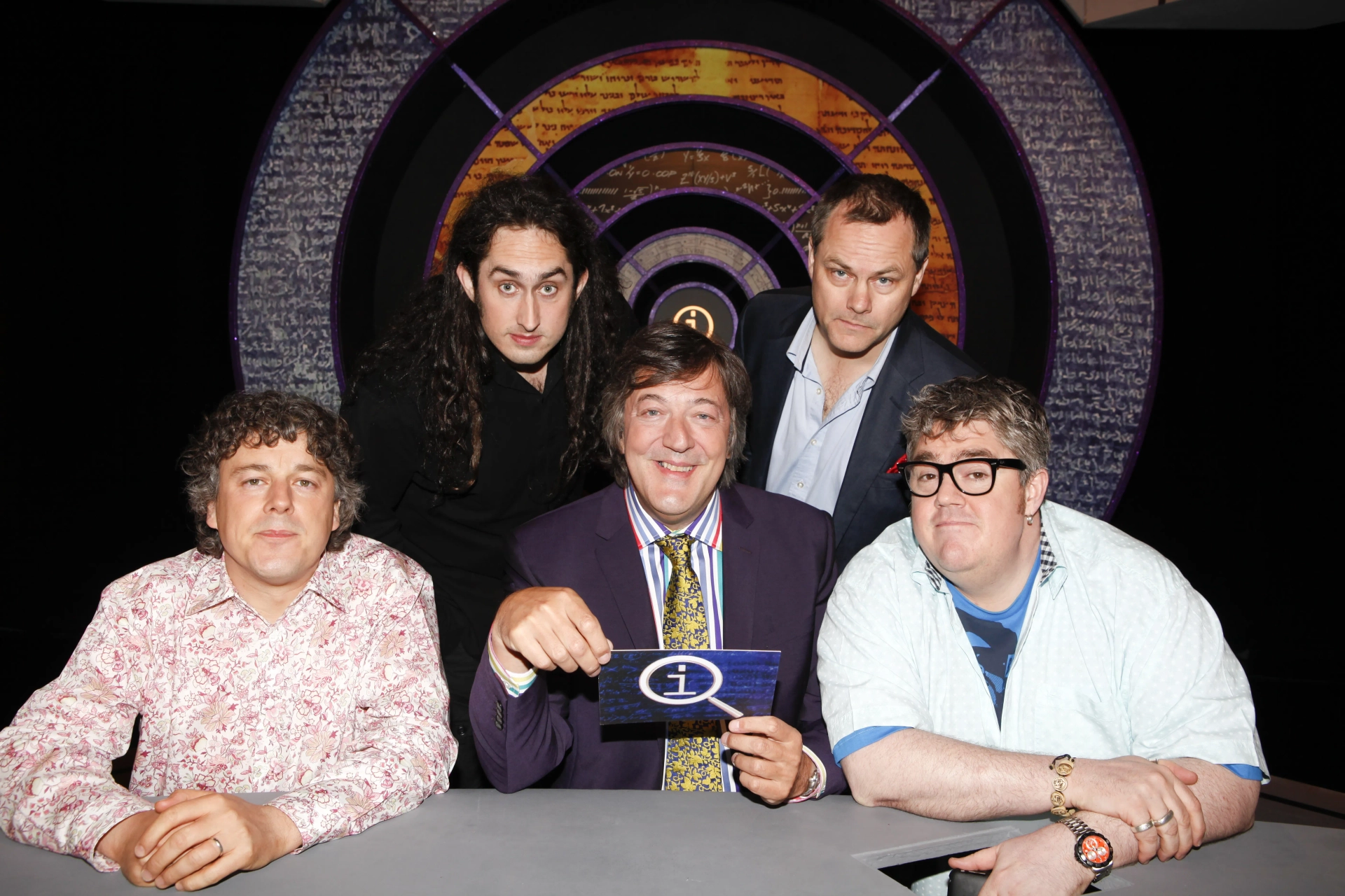 Stephen Fry, Alan Davies, Jack Dee, Phill Jupitus, and Ross Noble in QI (2003)