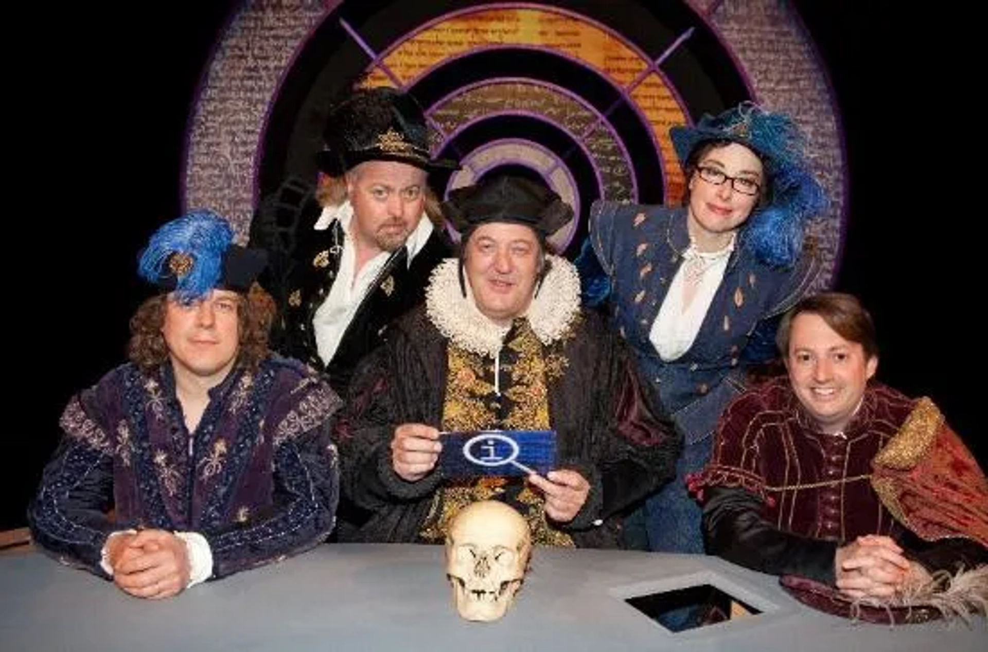 Stephen Fry, Bill Bailey, Alan Davies, David Mitchell, and Sue Perkins in QI (2003)