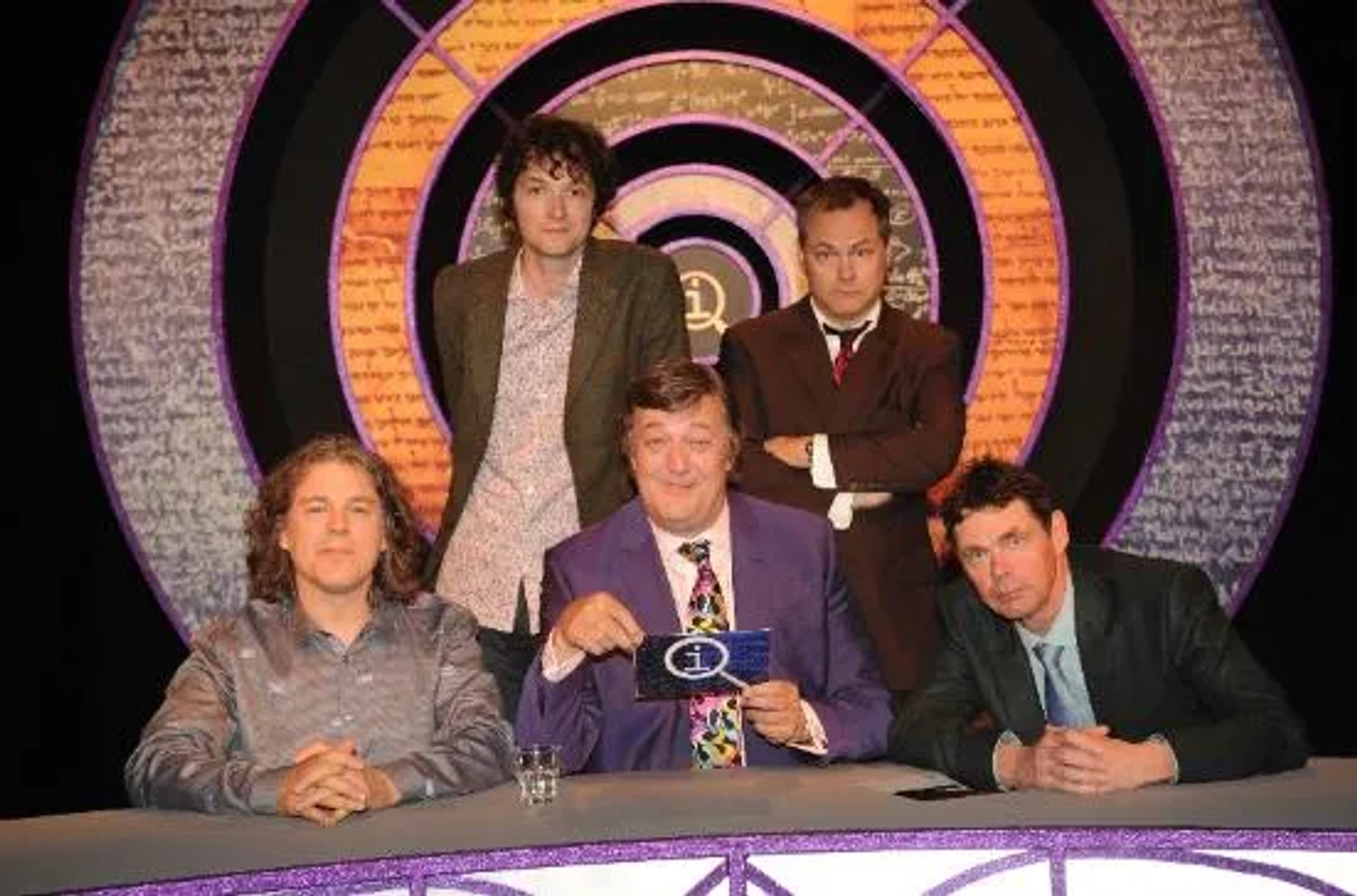 Stephen Fry, Alan Davies, Jack Dee, Rich Hall, and Chris Addison in QI (2003)