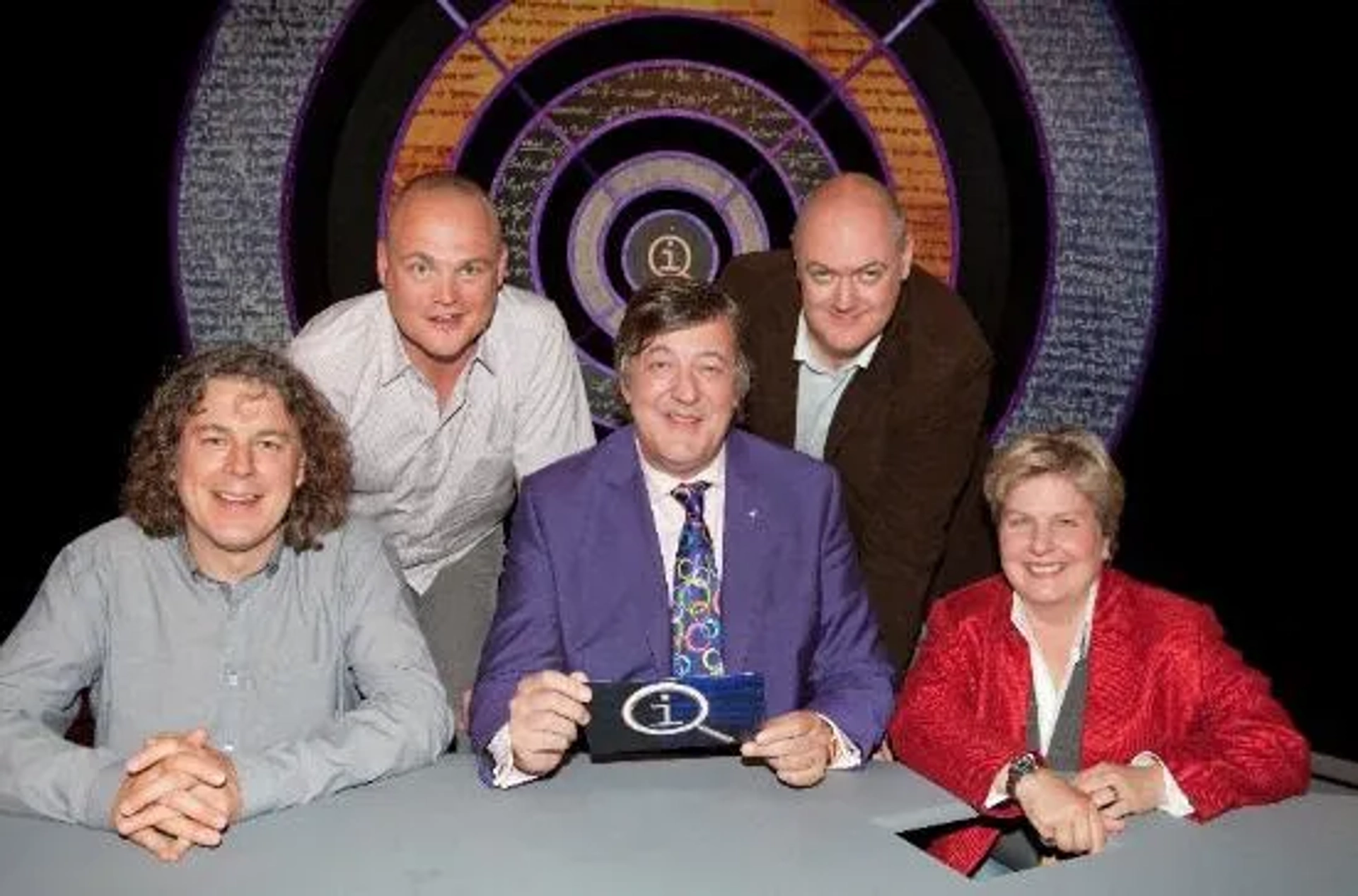 Stephen Fry, Alan Davies, Al Murray, Sandi Toksvig, and Dara O Briain in QI (2003)