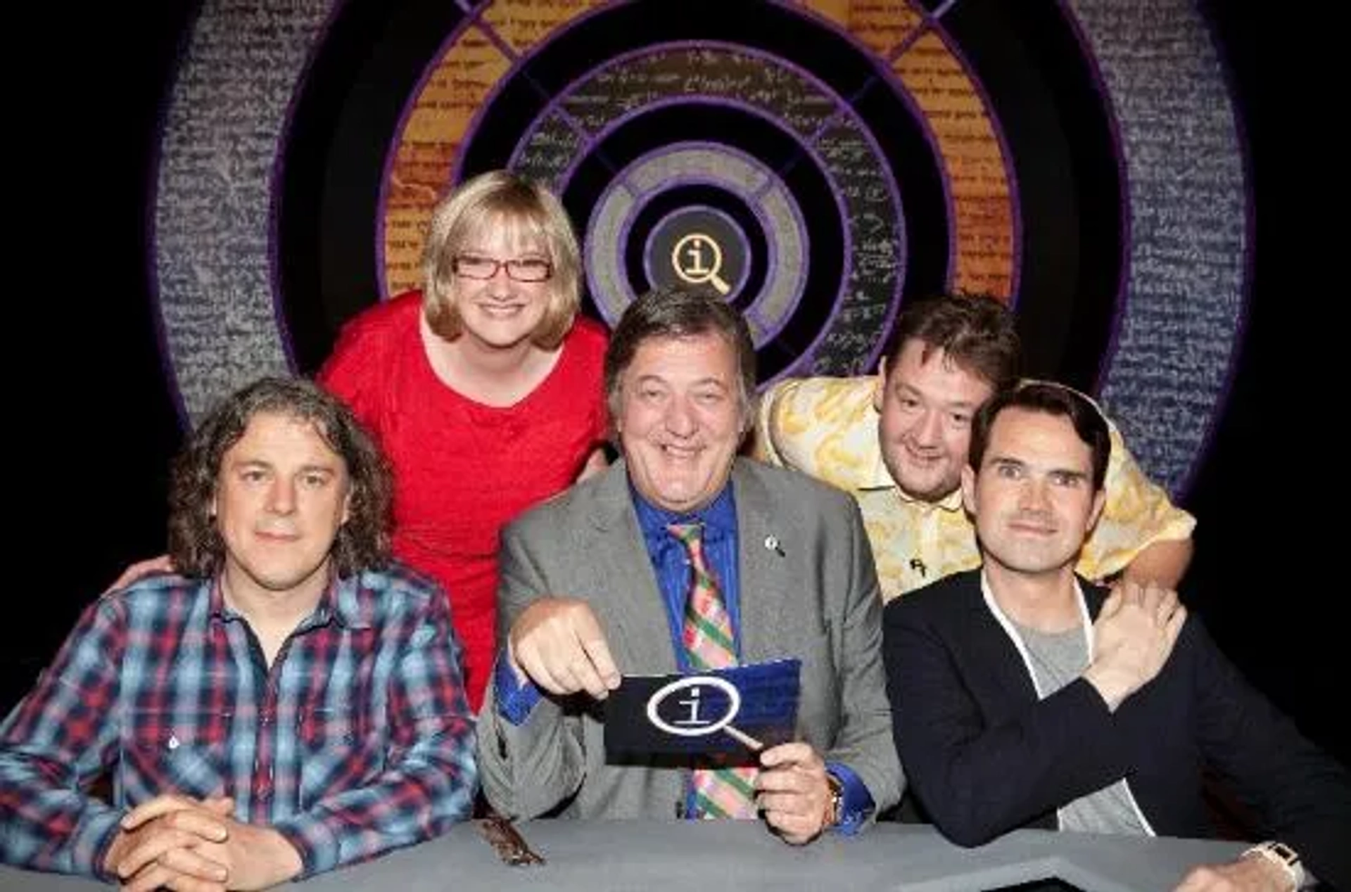 Stephen Fry, Jimmy Carr, Alan Davies, Johnny Vegas, and Sarah Millican in QI (2003)