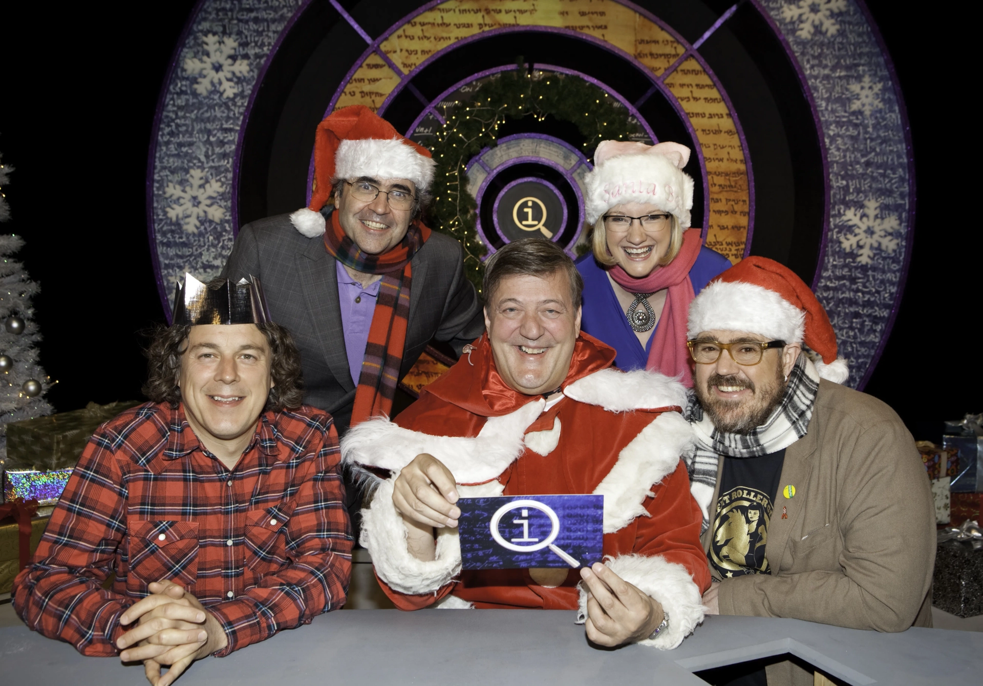 Stephen Fry, Danny Baker, Alan Davies, Phill Jupitus, and Sarah Millican in QI (2003)