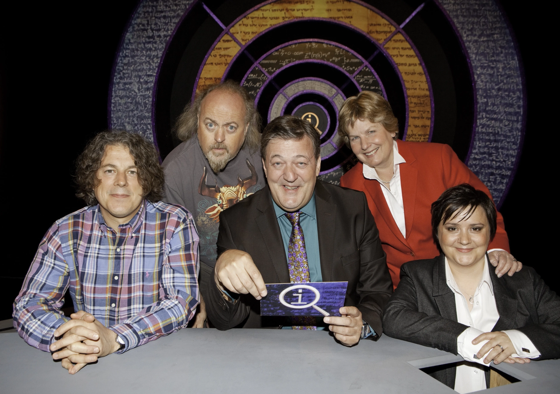 Stephen Fry, Bill Bailey, Alan Davies, Sandi Toksvig, and Susan Calman in QI (2003)