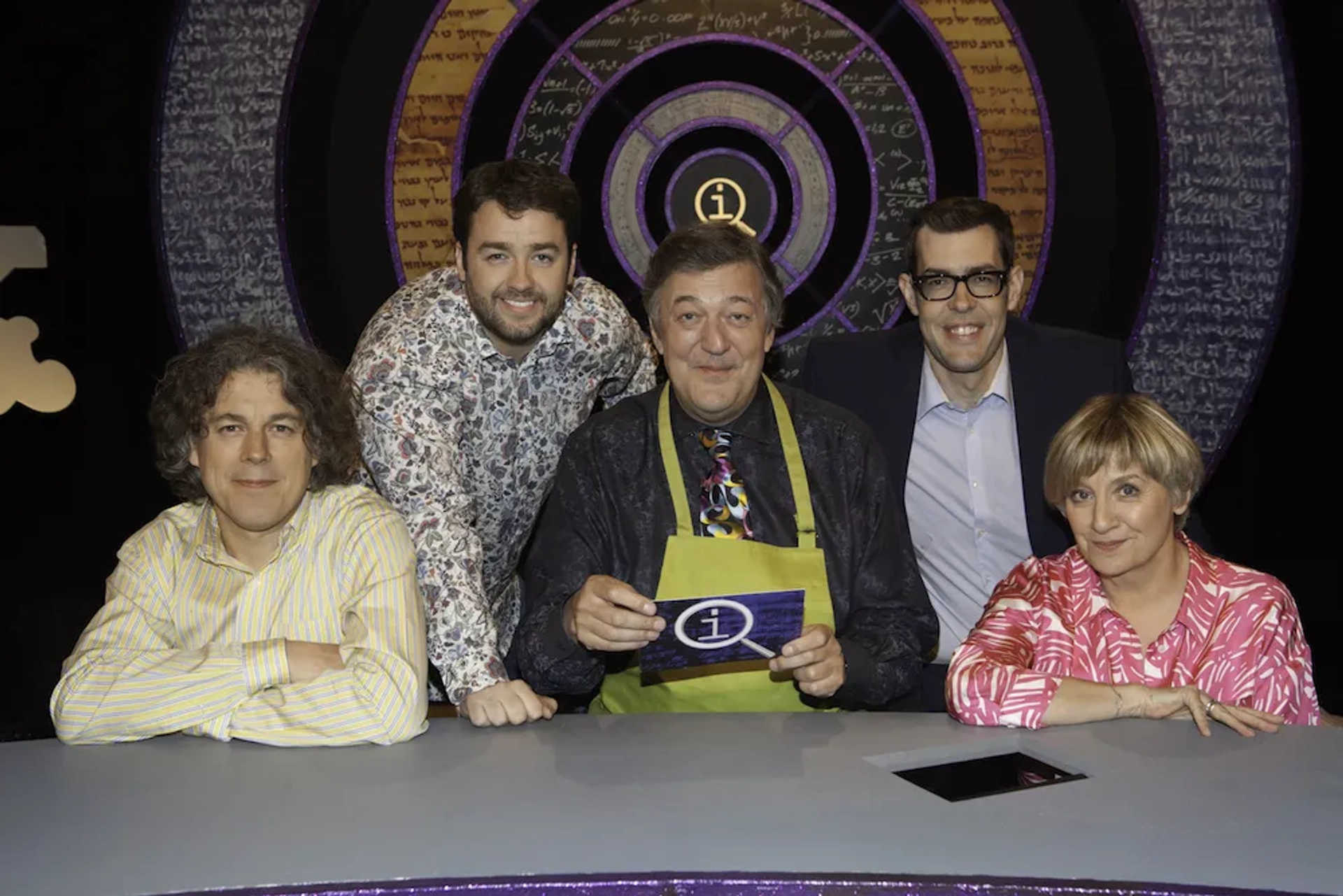 Stephen Fry, Alan Davies, Richard Osman, Victoria Wood, and Jason Manford in QI (2003)