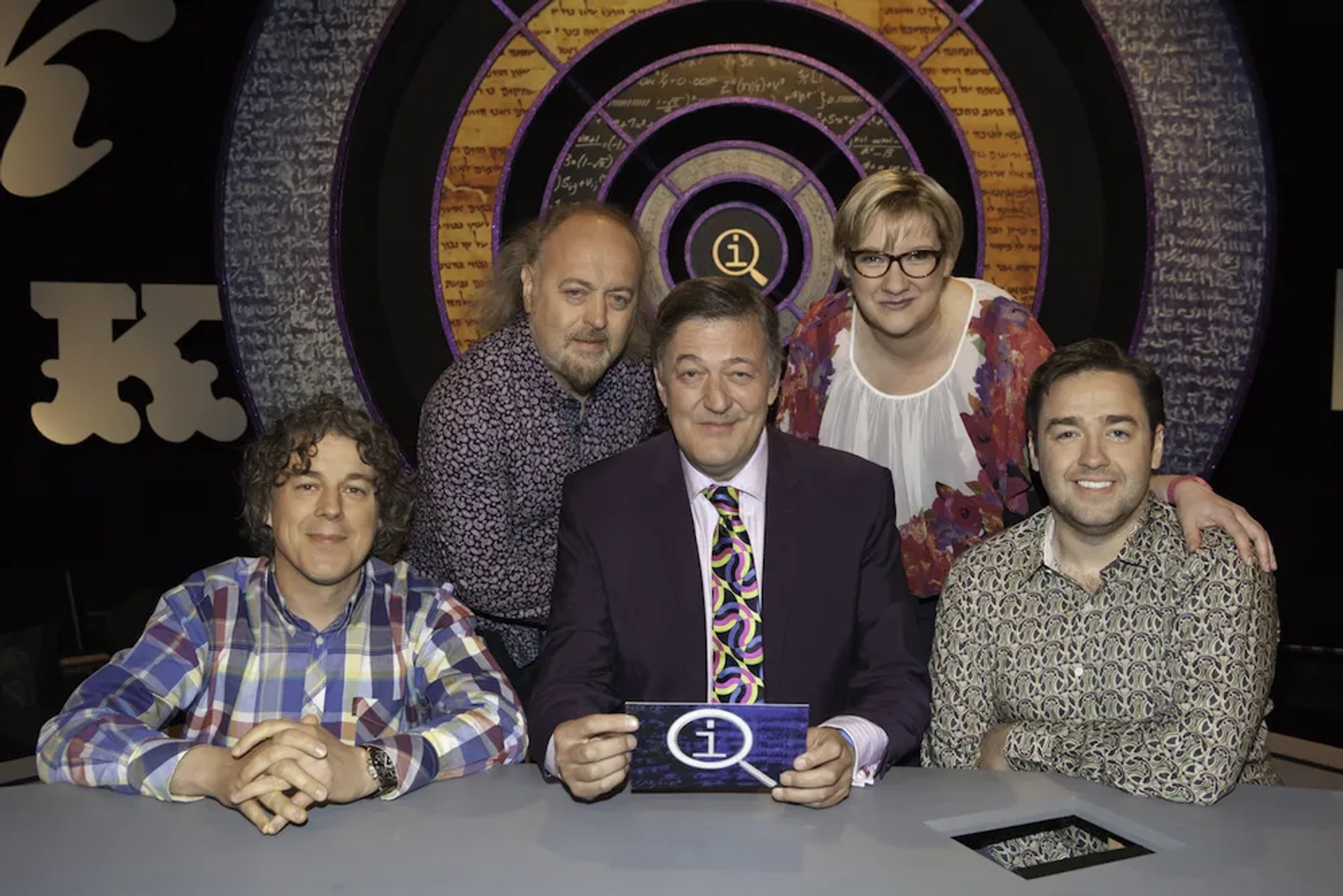 Stephen Fry, Bill Bailey, Alan Davies, Jason Manford, and Sarah Millican in QI (2003)