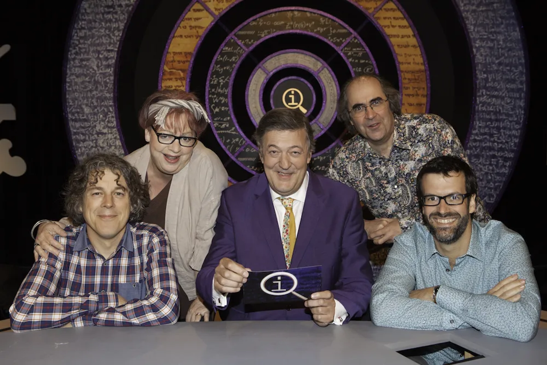 Stephen Fry, Danny Baker, Jo Brand, Marcus Brigstocke, and Alan Davies in QI (2003)