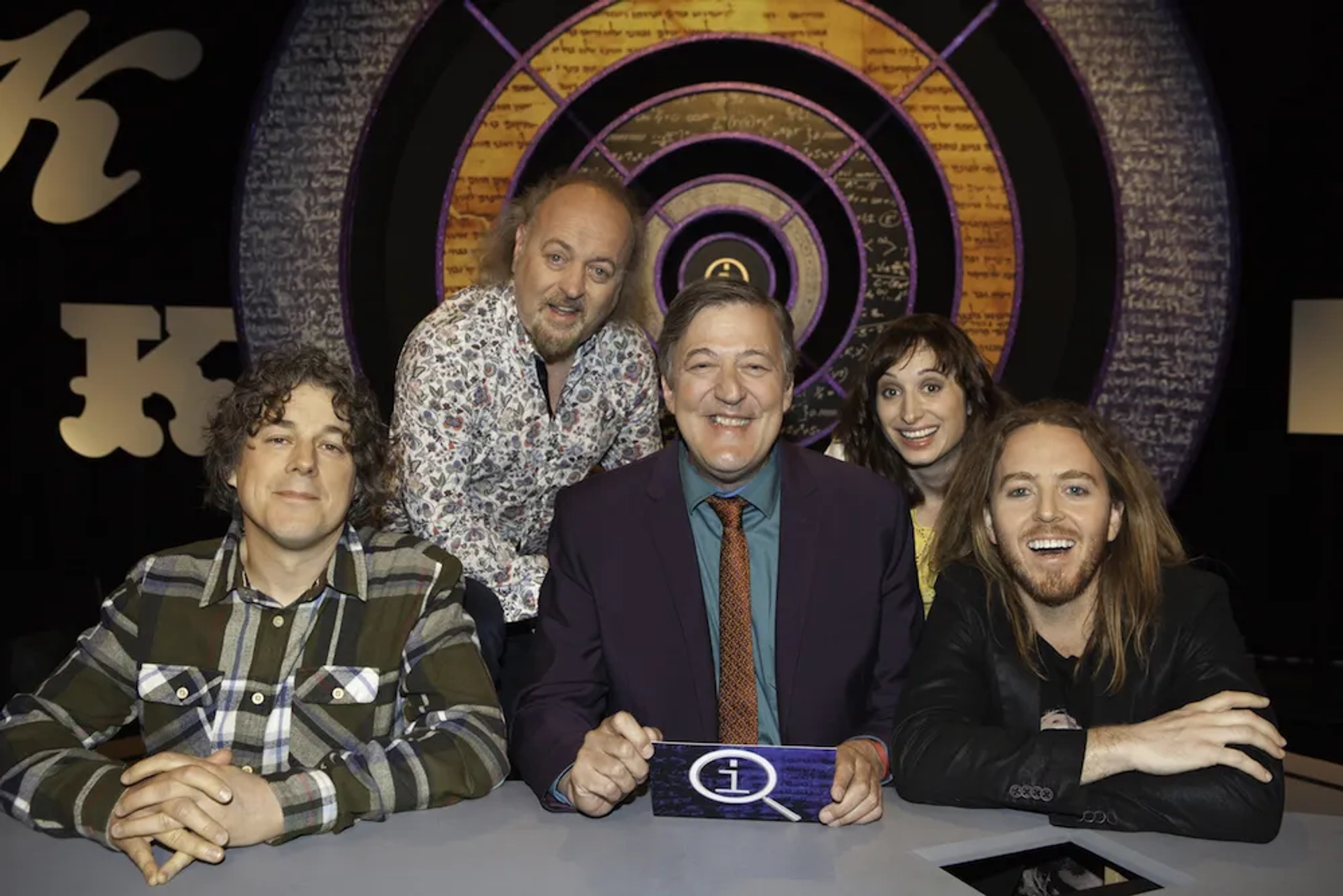 Stephen Fry, Bill Bailey, Alan Davies, Tim Minchin, and Isy Suttie in QI (2003)