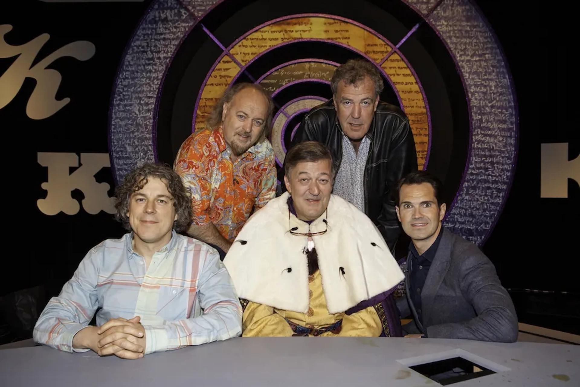 Stephen Fry, Bill Bailey, Jimmy Carr, Jeremy Clarkson, and Alan Davies in QI (2003)