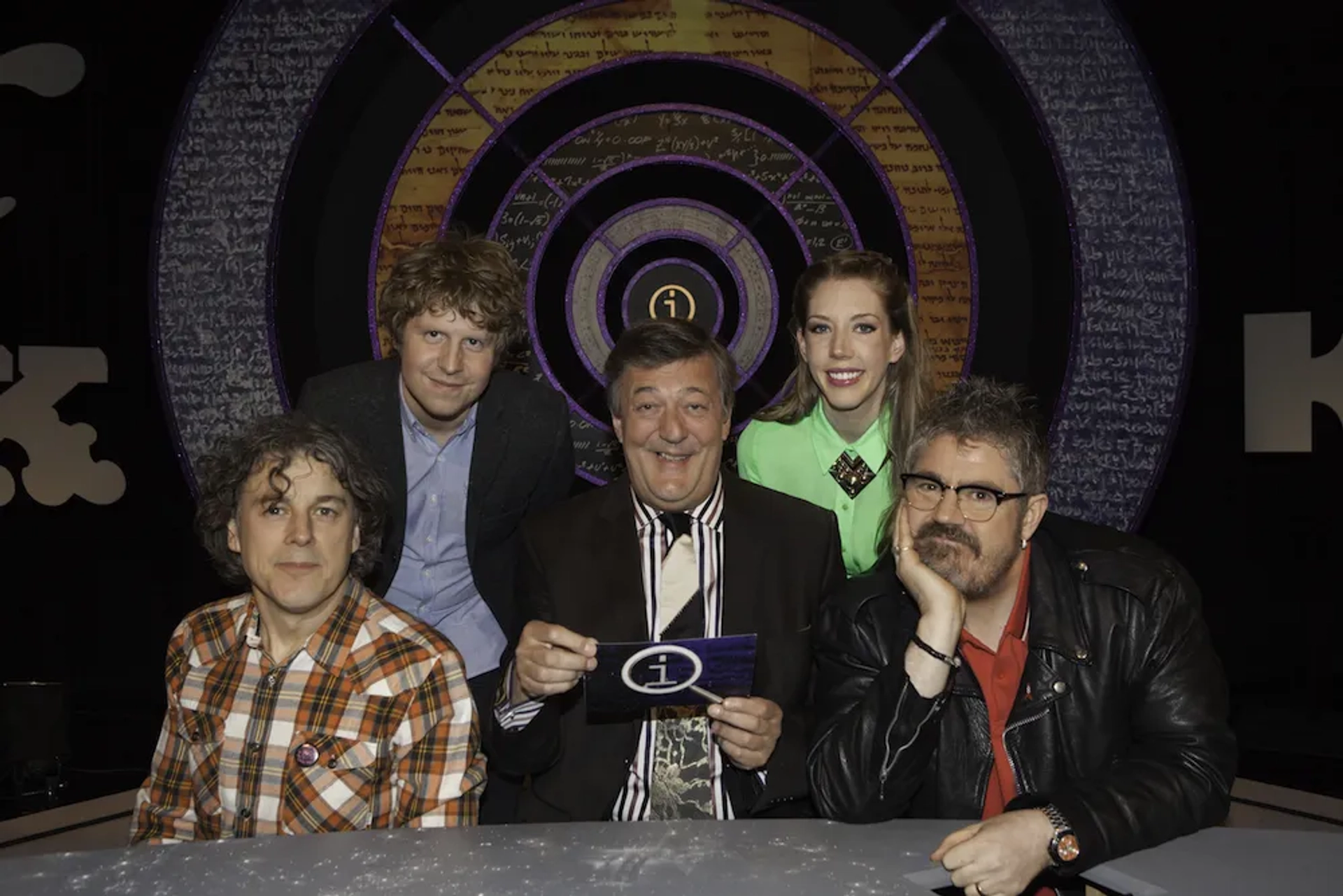 Stephen Fry, Alan Davies, Phill Jupitus, Katherine Ryan, and Josh Widdicombe in QI (2003)