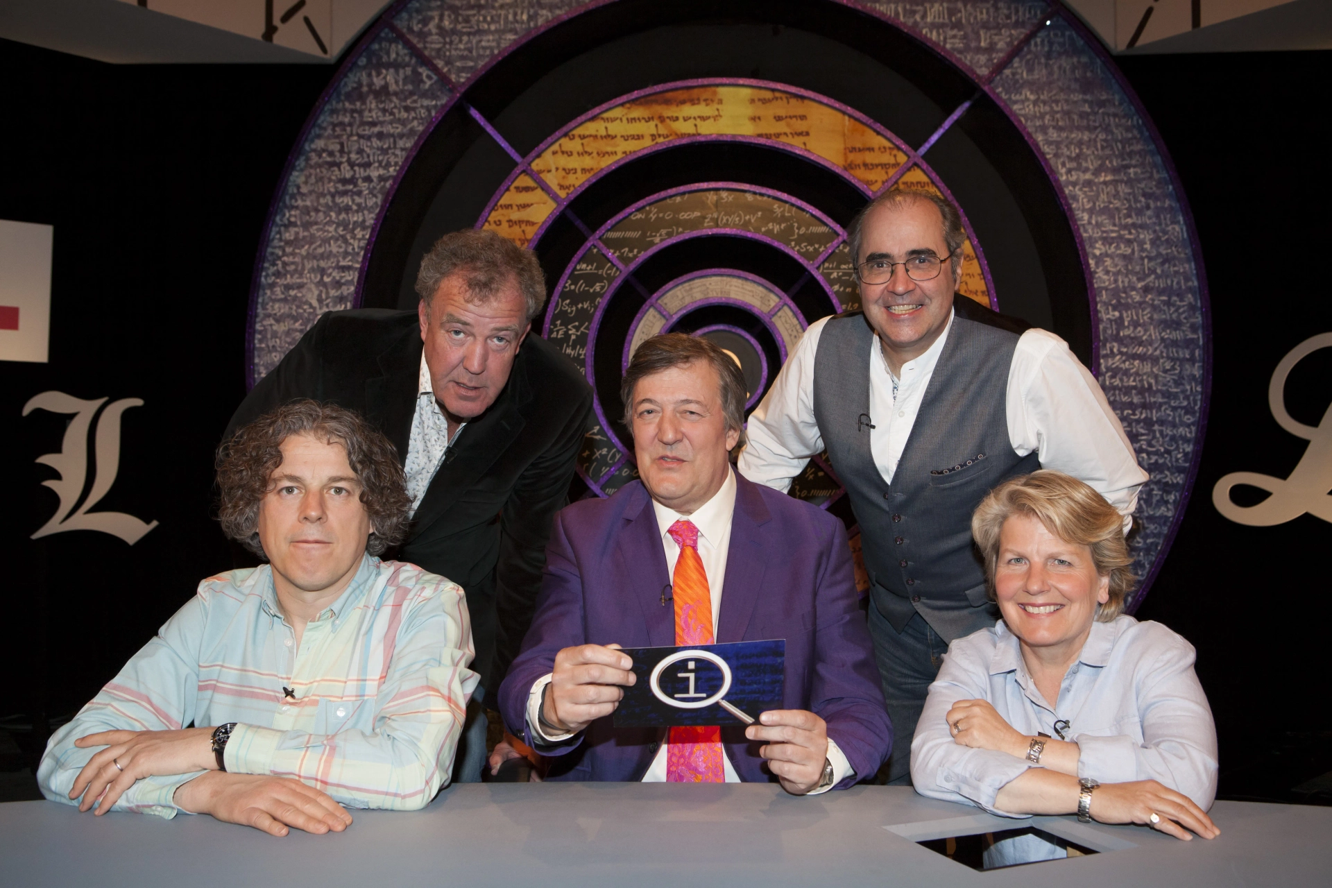 Stephen Fry, Danny Baker, Jeremy Clarkson, Alan Davies, and Sandi Toksvig in QI (2003)