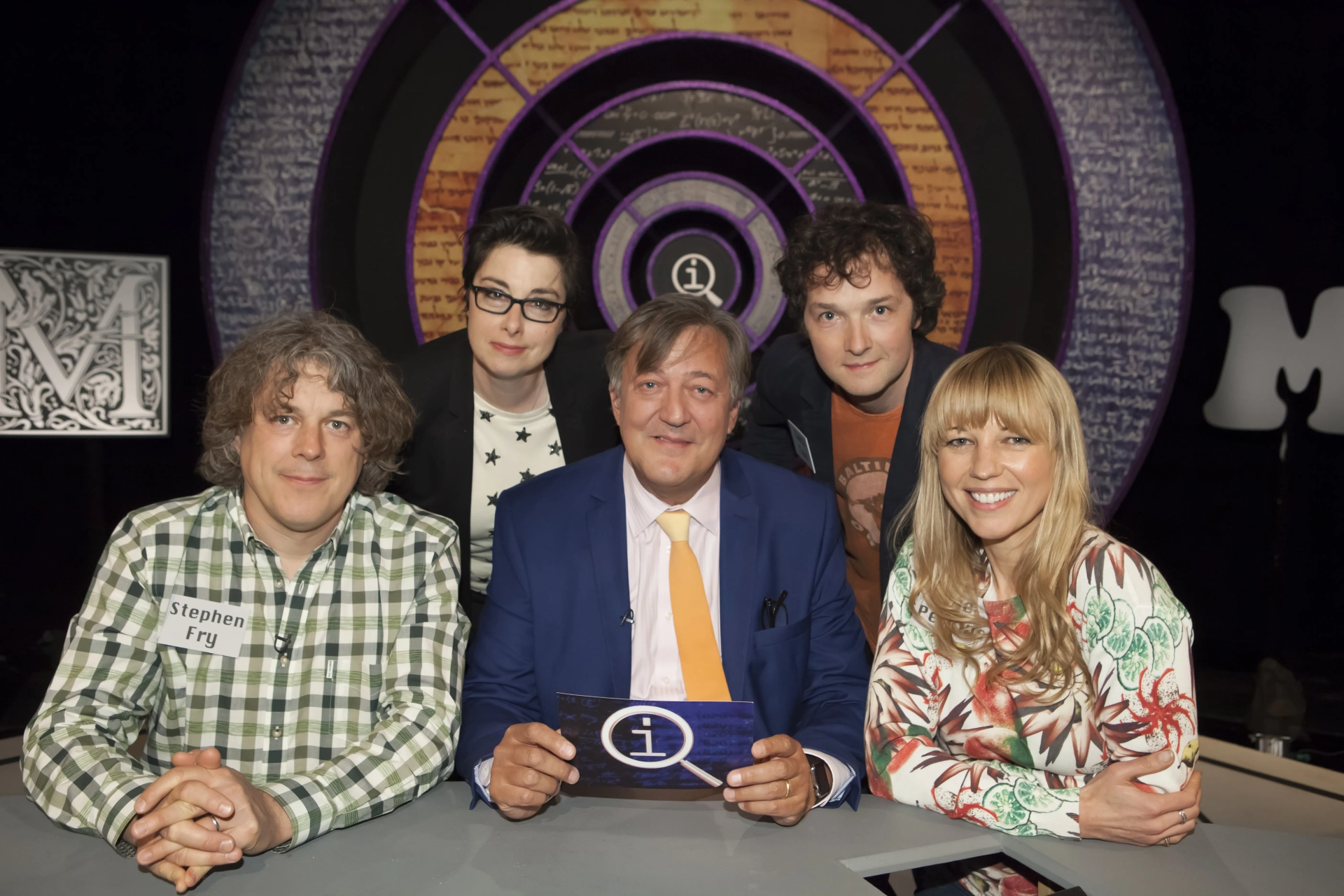 Stephen Fry, Sara Cox, Alan Davies, Sue Perkins, and Chris Addison in QI (2003)