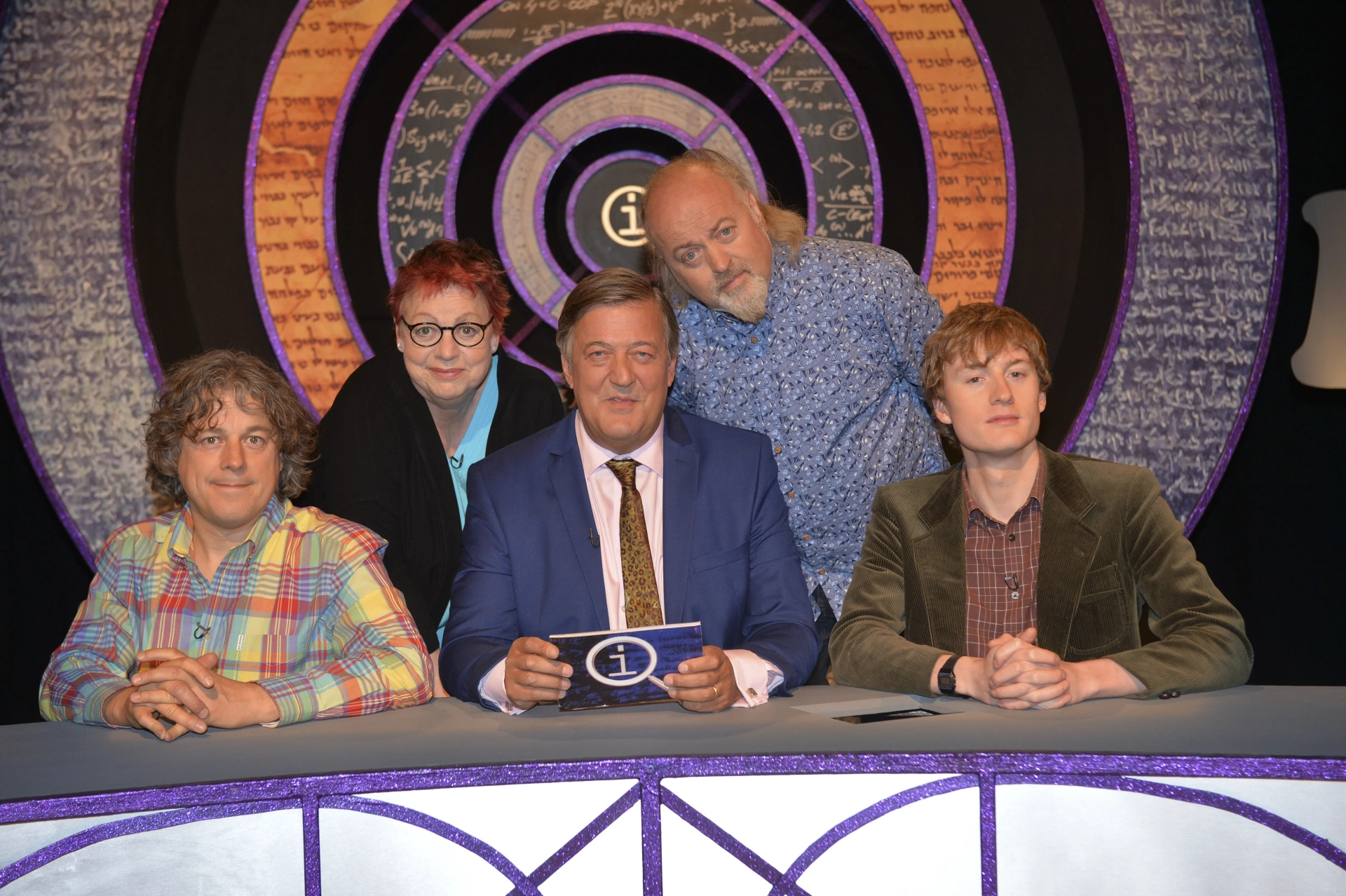 Stephen Fry, Bill Bailey, Jo Brand, Alan Davies, and James Acaster in QI (2003)