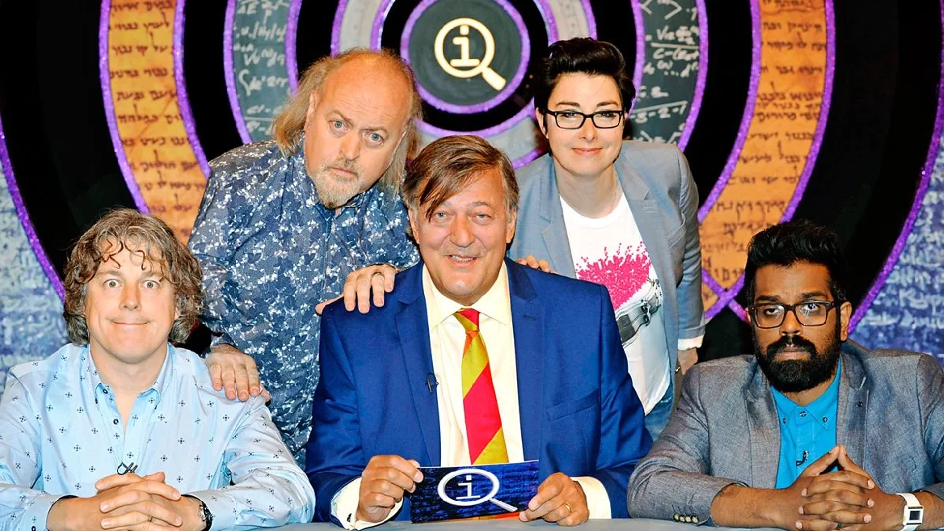 Stephen Fry, Bill Bailey, Alan Davies, Sue Perkins, and Romesh Ranganathan in QI (2003)