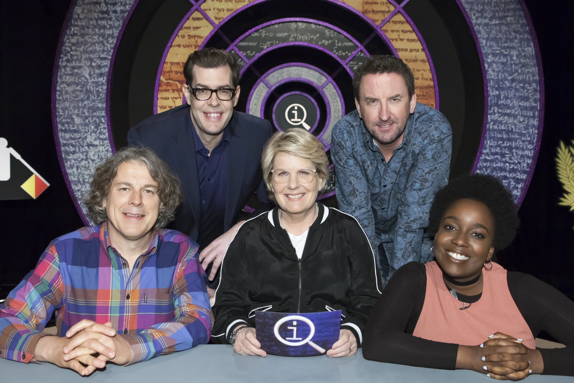 Alan Davies, Richard Osman, Sandi Toksvig, Lee Mack, and Lolly Adefope in QI (2003)