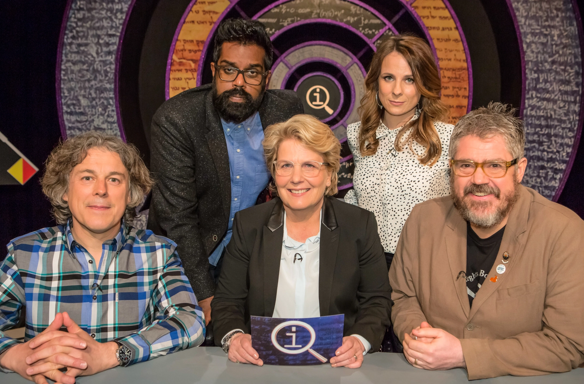 Alan Davies, Phill Jupitus, Sandi Toksvig, Cariad Lloyd, and Romesh Ranganathan in QI (2003)