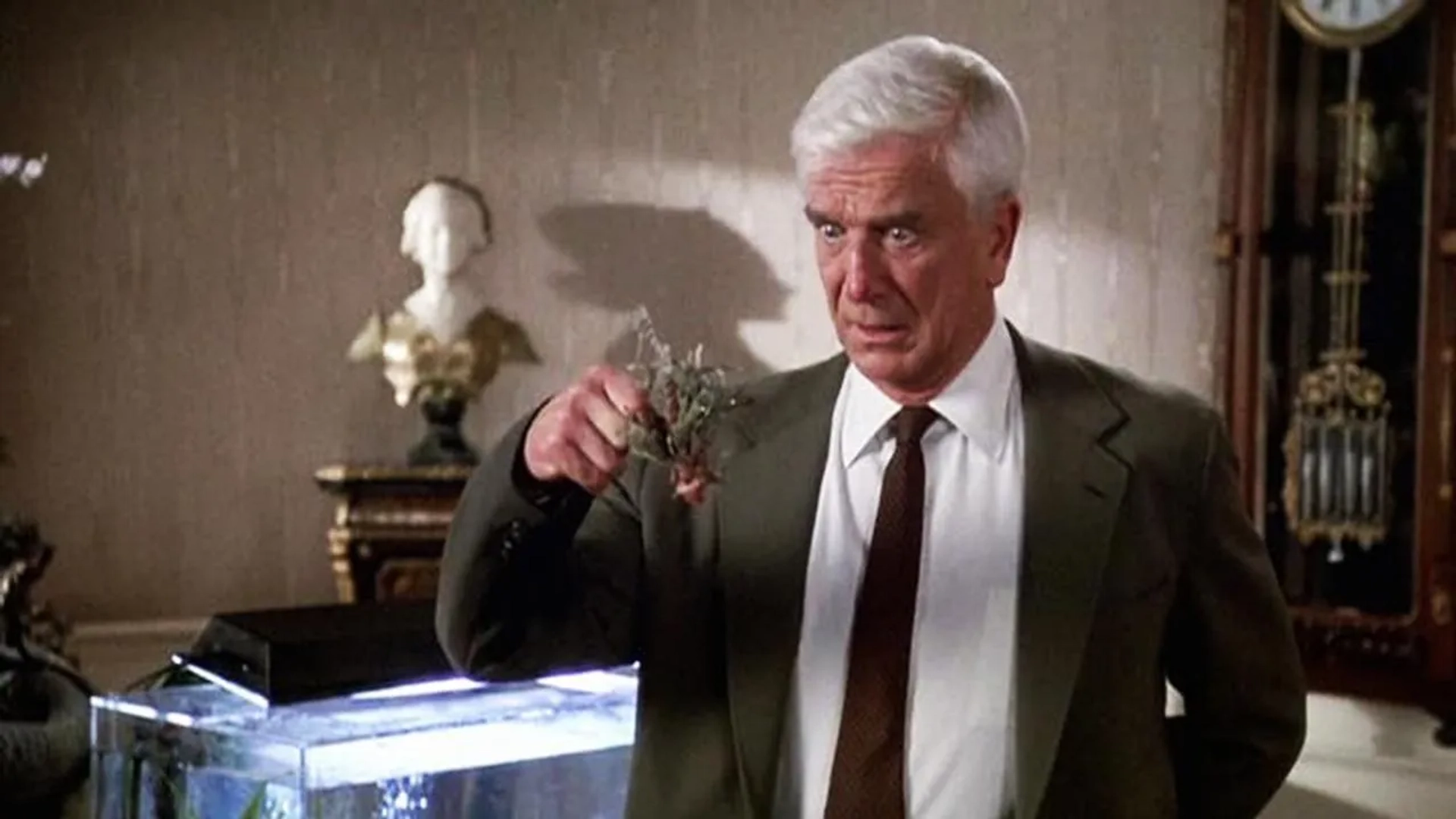 Leslie Nielsen in The Naked Gun: From the Files of Police Squad! (1988)