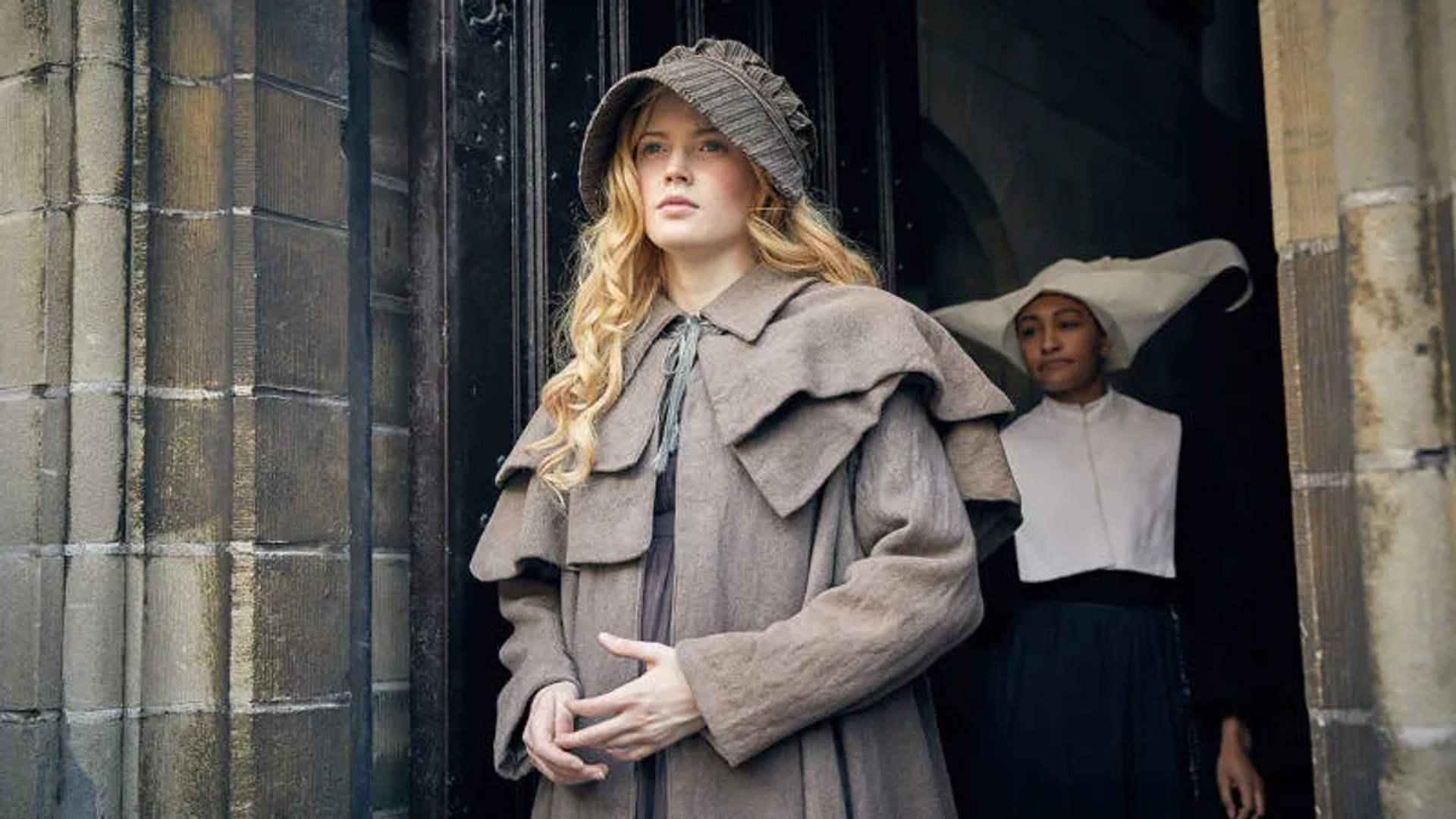 Ellie Bamber and Natalie Simpson in Les Misérables (2018)