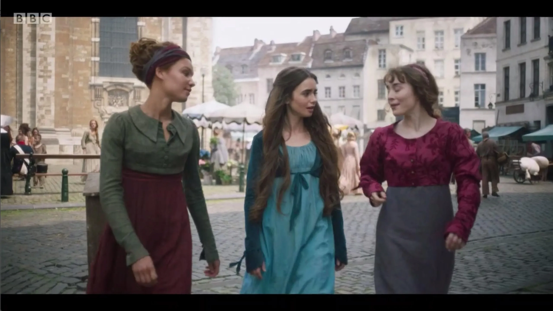 Lily Collins, Charlotte Dylan Blake, and Ayoola Smart in Les Misérables (2018)