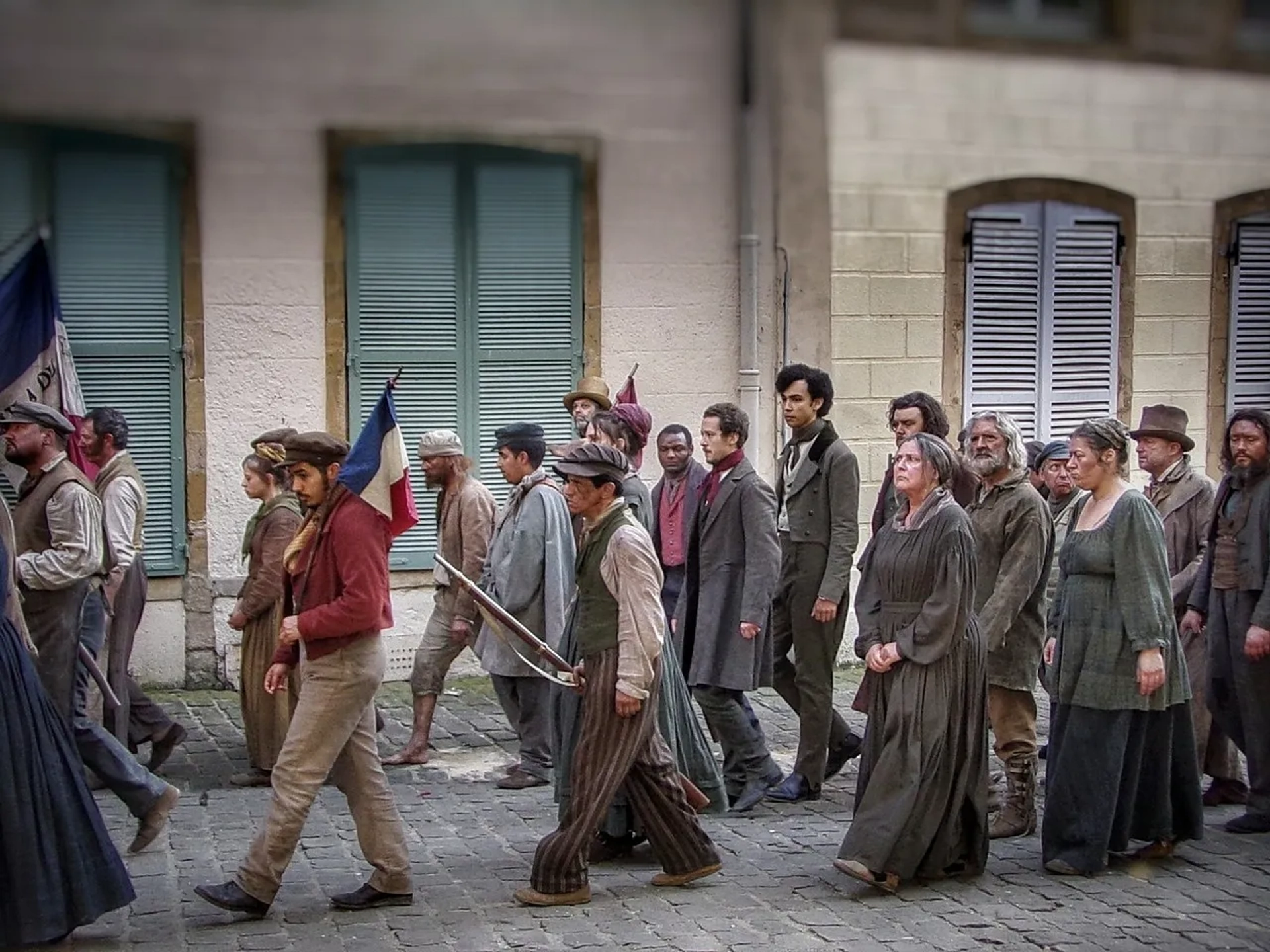 Joseph Quinn, Archie Madekwe, and Turlough Convery in Les Misérables (2018)